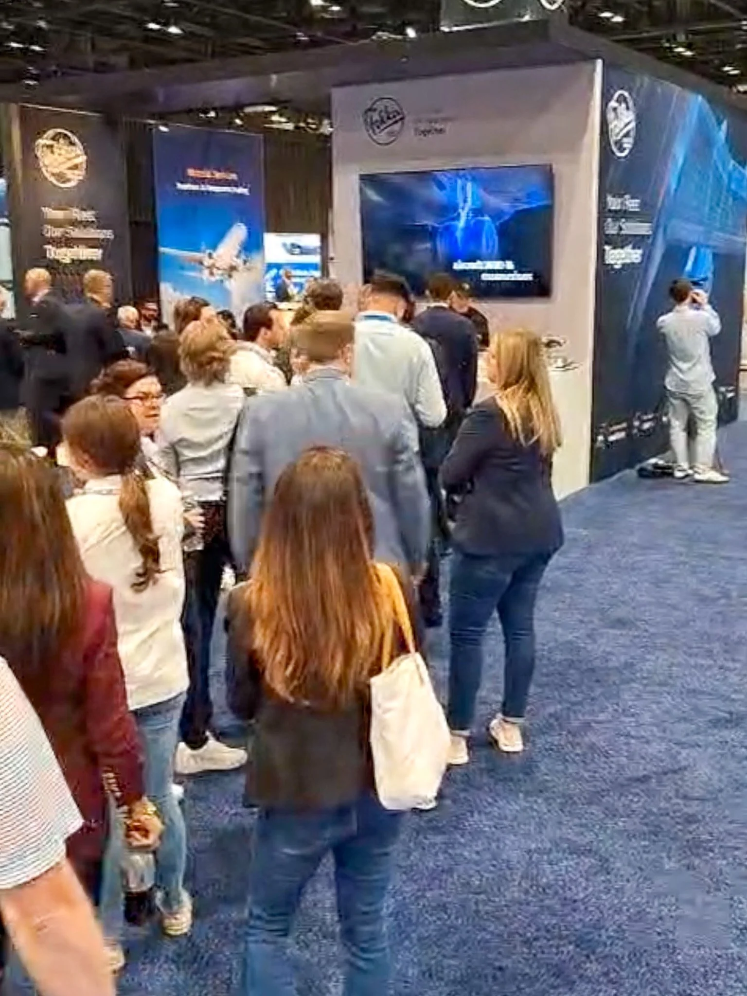Guests waiting in line for freshly baked stroopwafels at a live event setup.