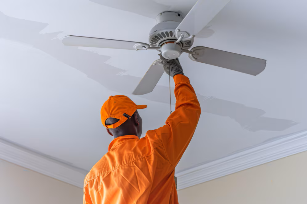 electrician-installing-ceiling-fan_1203353-26285.png