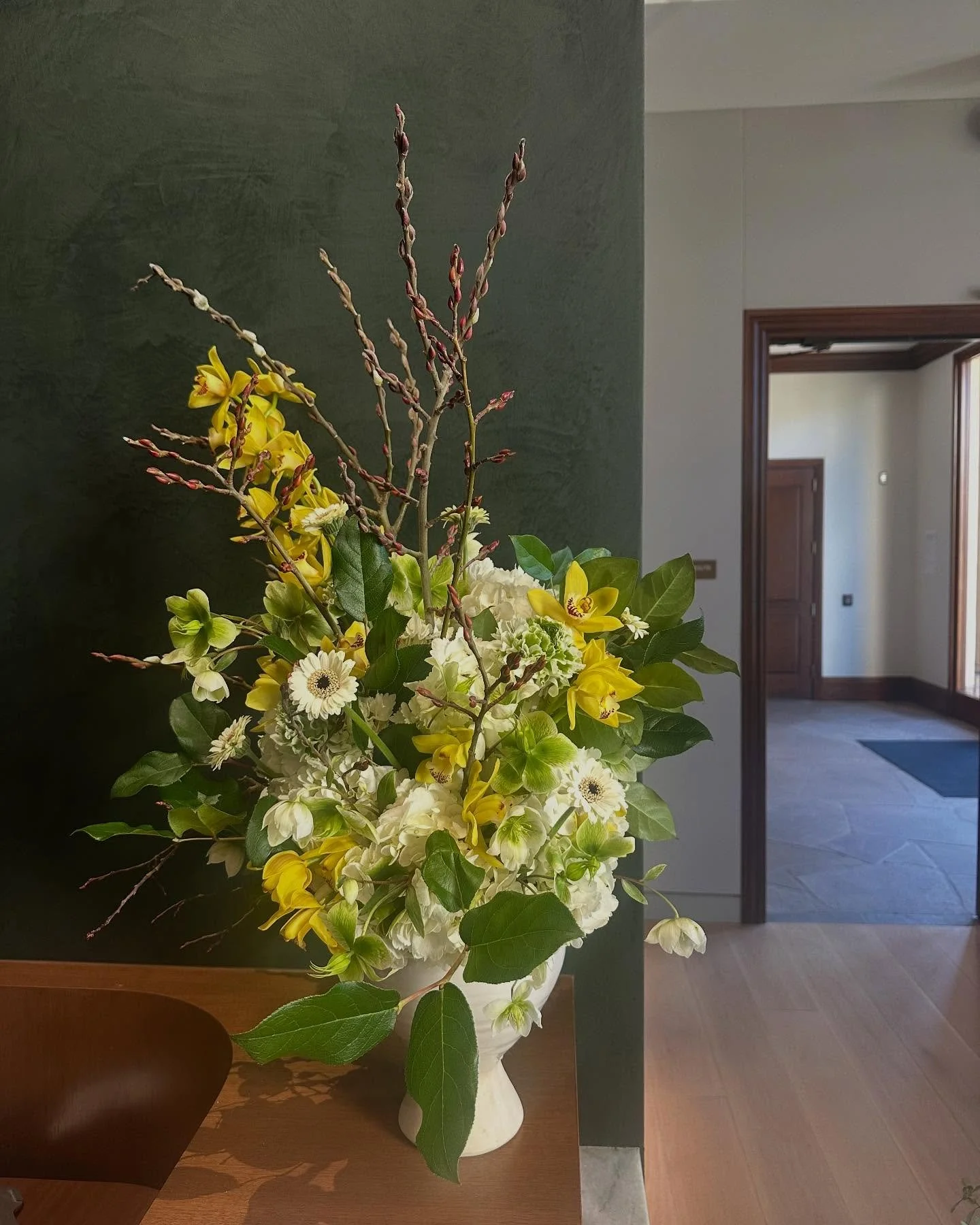 White &amp; green with pops of yellow cymbidiums