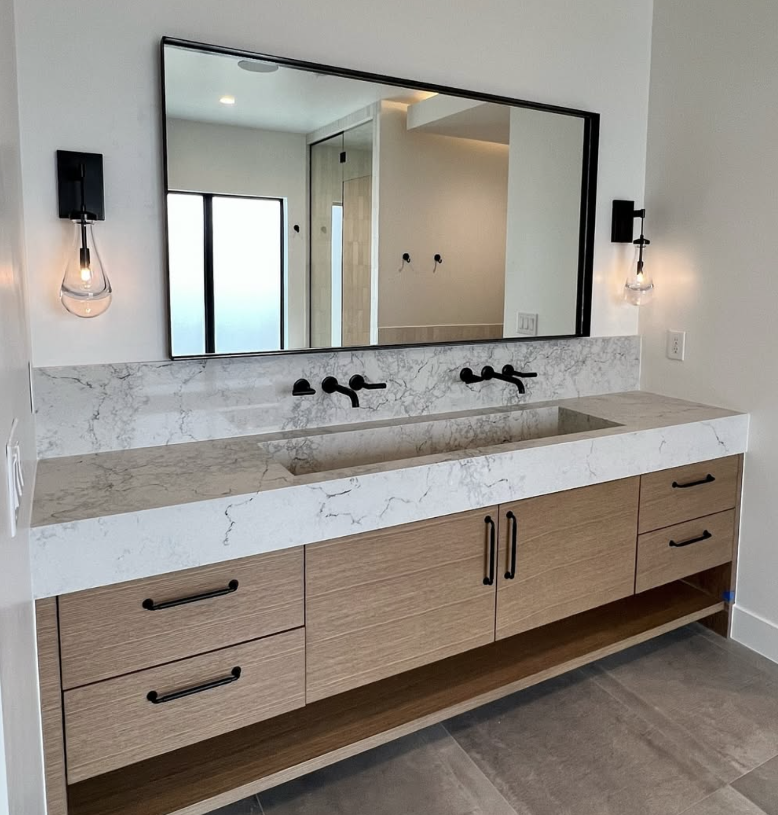 a modern bathroom in a high end new construction home