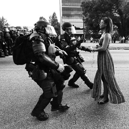 ren&middot;e&middot;gade babe 
 ⠀⠀⠀⠀⠀⠀⠀⠀⠀⠀⠀⠀
(noun) [ren-i-geyd beyb] 
 ⠀⠀⠀⠀⠀⠀⠀⠀⠀⠀⠀⠀

A womxn who refuses allegiance to, resists, or rises against oppressive institutions.
 ⠀⠀⠀⠀⠀⠀⠀⠀⠀⠀⠀⠀

Baton Rouge, Louisiana, July 9, 2016  27 year old Ieshia Evans,
