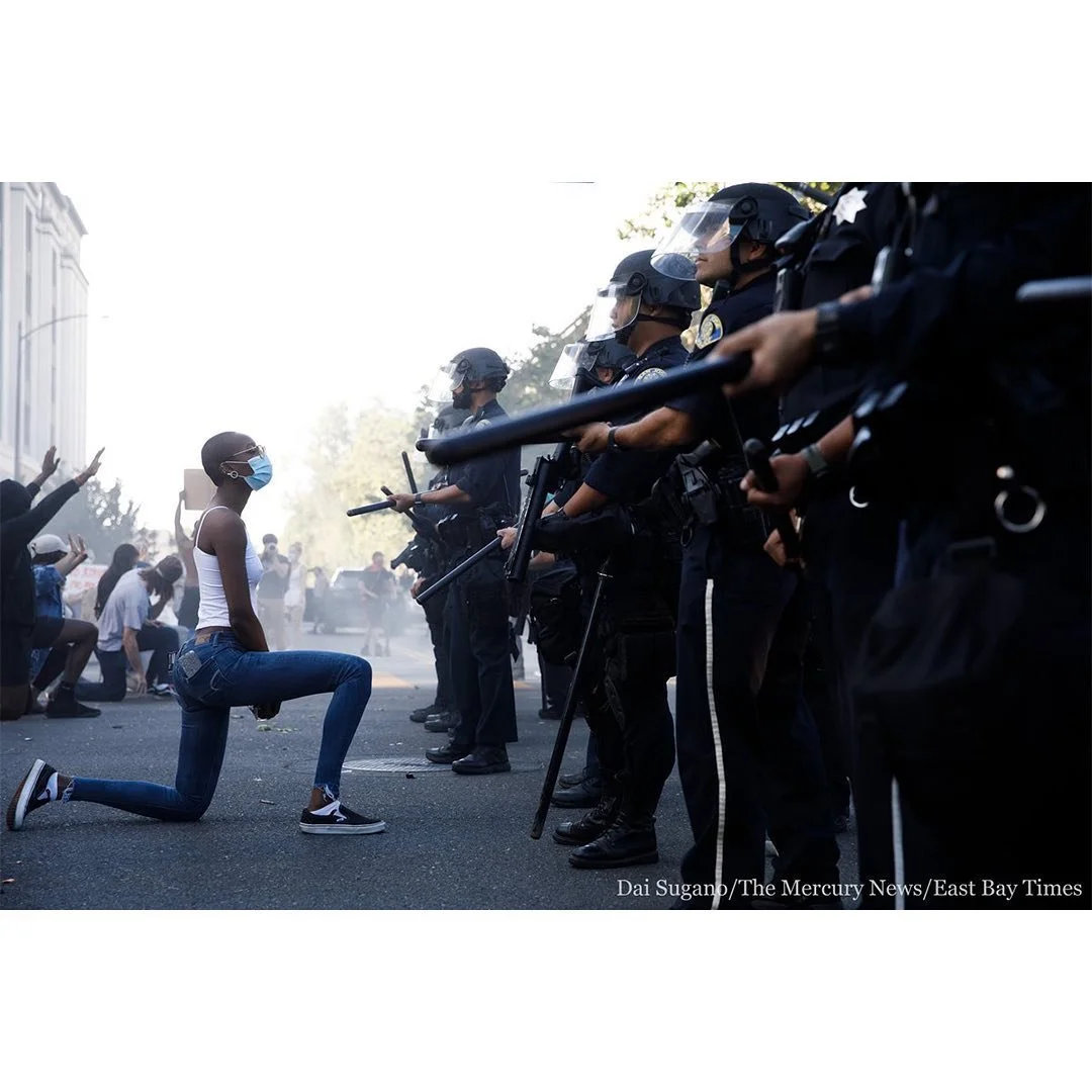 Such a powerful image. A #brave #young #Black #woman takes a knee at the feet of a #military #police #force.
⁣
Repost from photojournalist @daisugano⁣
・・・⁣
A protester takes a knee during a #SanJoseprotest on Friday after #GeorgeFloyd's death in #Min