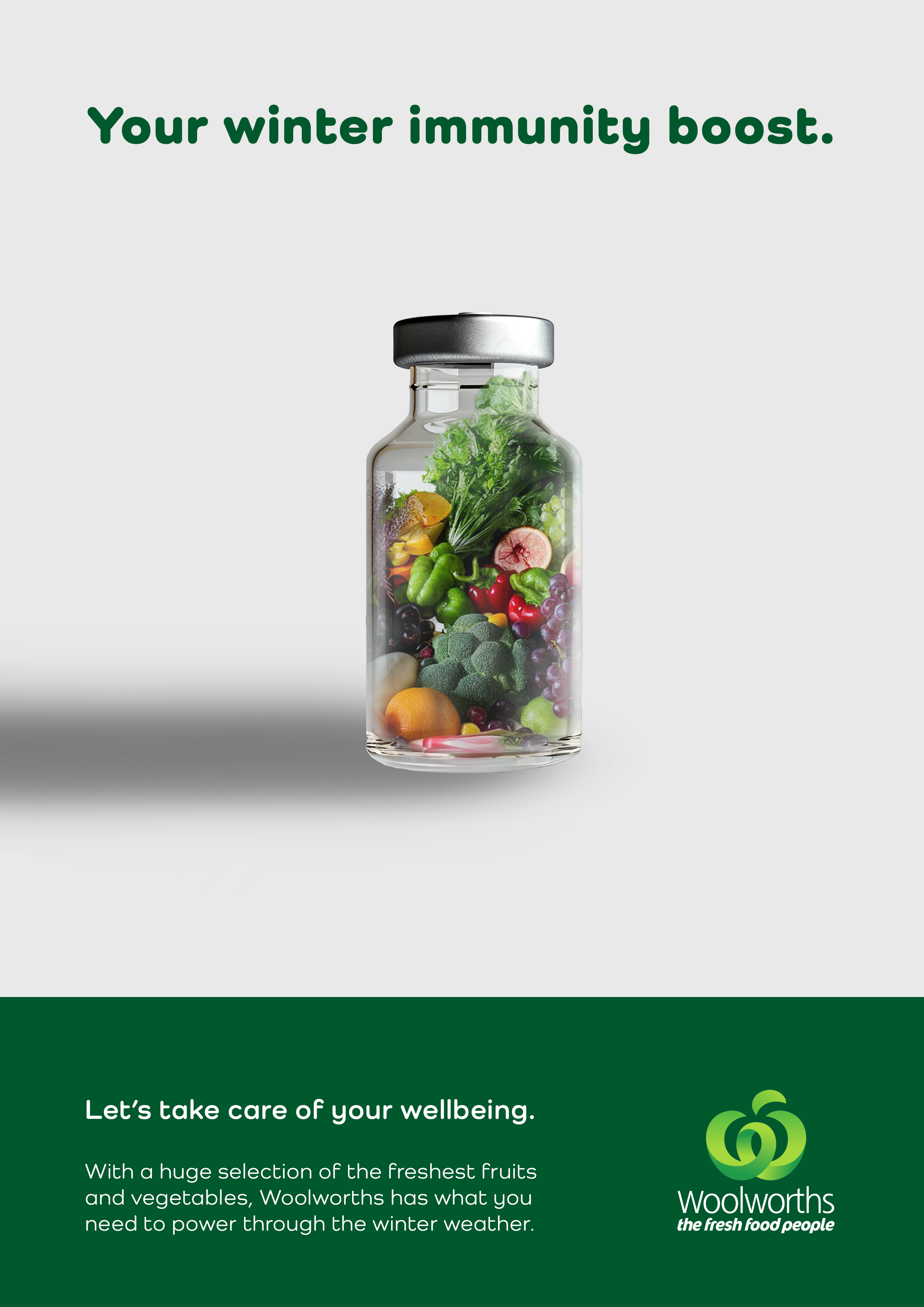 An advertisement for Woolworths promoting winter immunity with a glass jar filled with fresh fruits and vegetables.