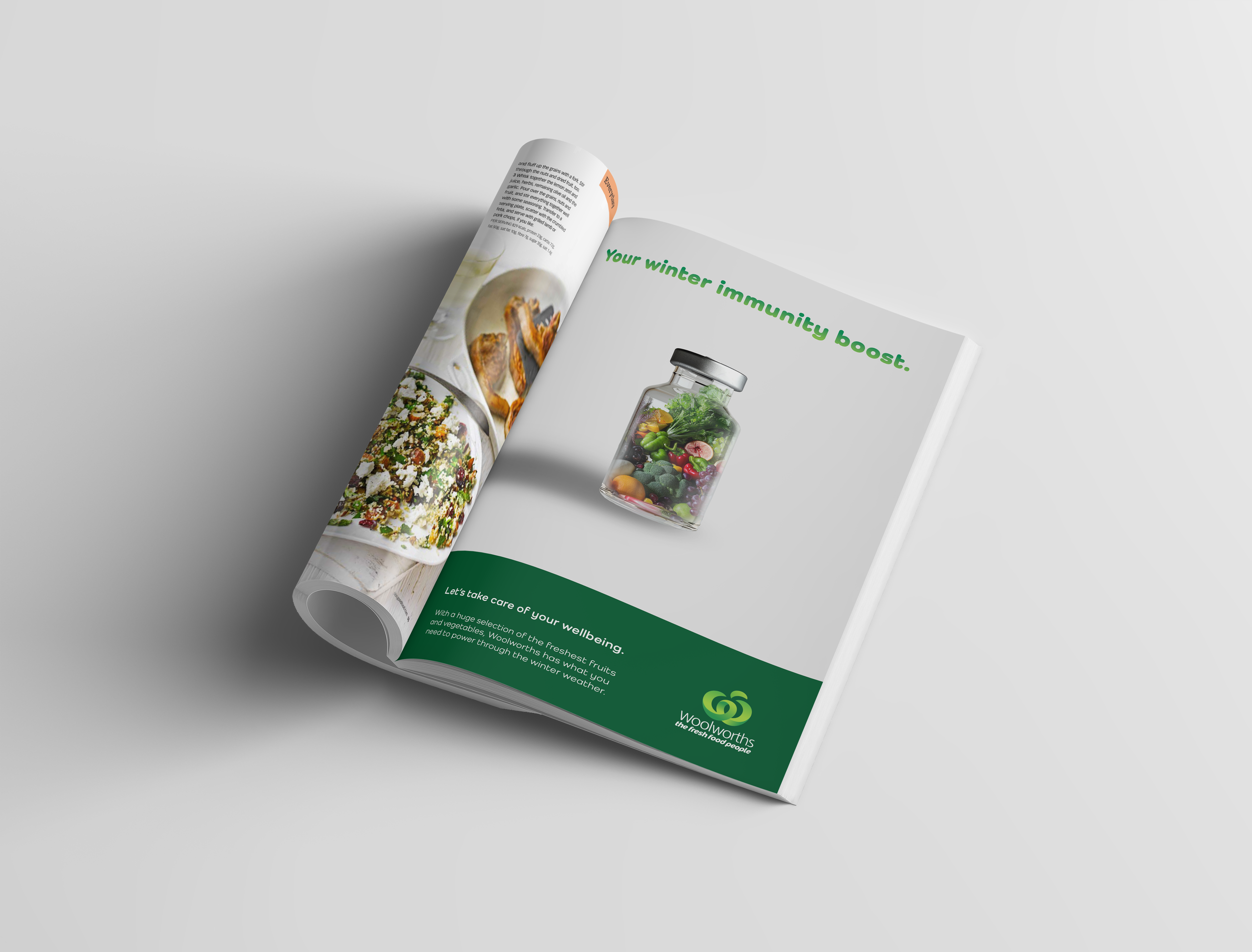Open magazine featuring a page with a jar of fresh vegetables and fruits, and headlines about boosting winter immunity and wellbeing, with a footer showing Woolworths logo.