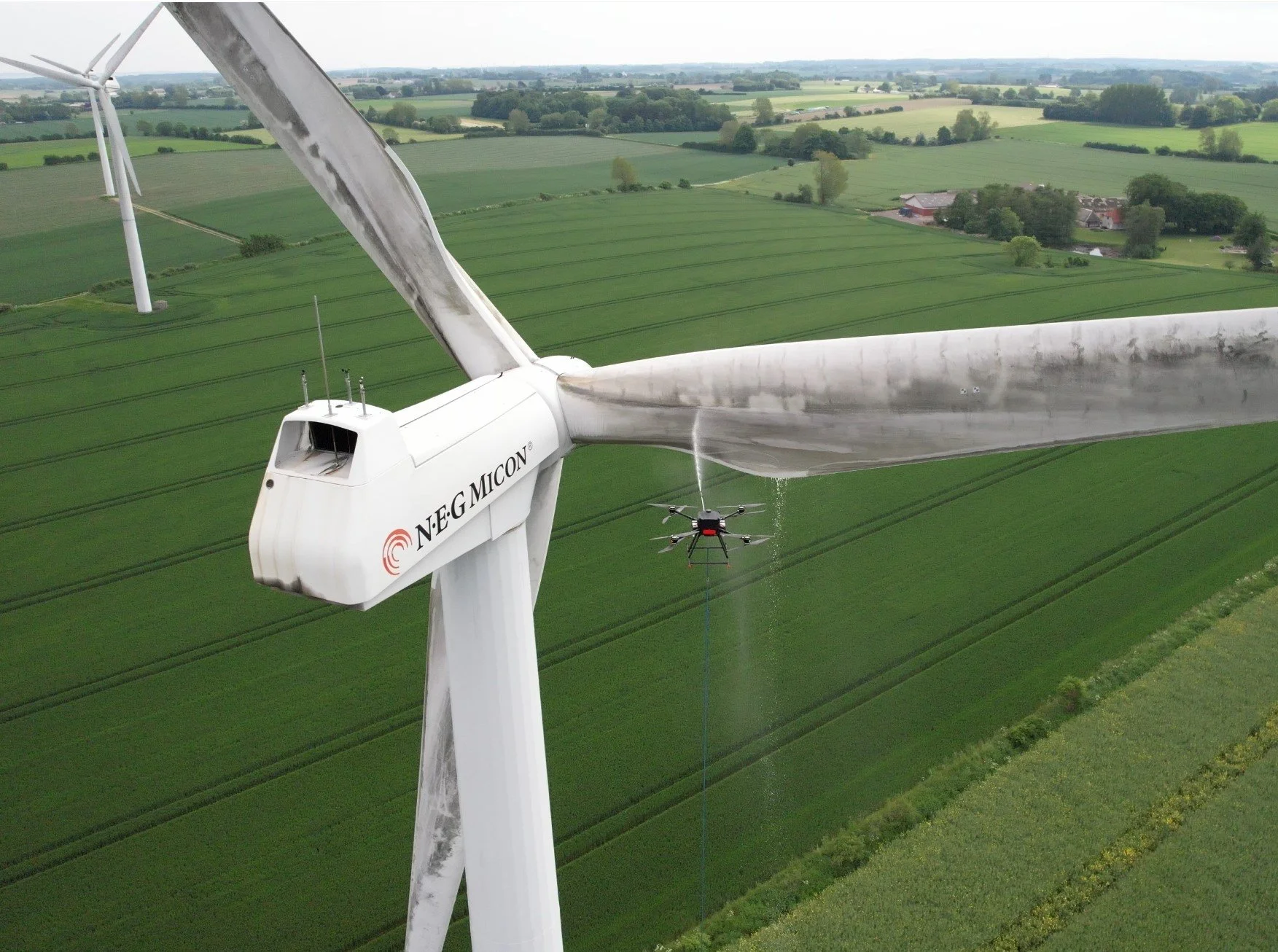 Drone cleaning wind turbine blade, efficient, safe, fast