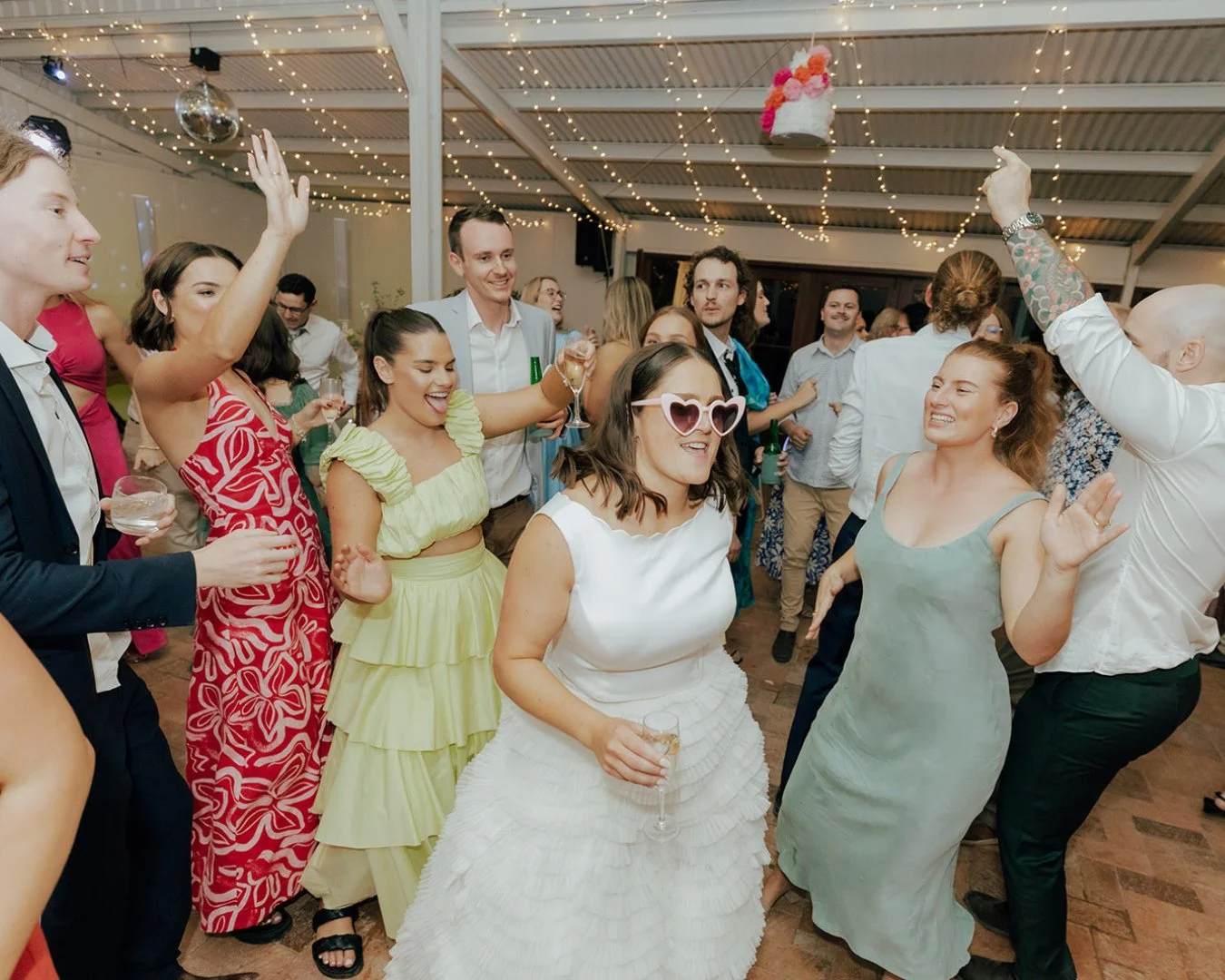 Brilliant outfits, wonderful souls, and bangin' music = a feast for the eyes, ears, and soul 🩷❤️🧡💛⁠
⁠
.⁠
⁠
Biggest ever shoutout to @valentinaperezstudio for capturing the colourful joy that was Sara and Luke's wedding at @harpers.farm 💚🩵💙💜⁠
⁠