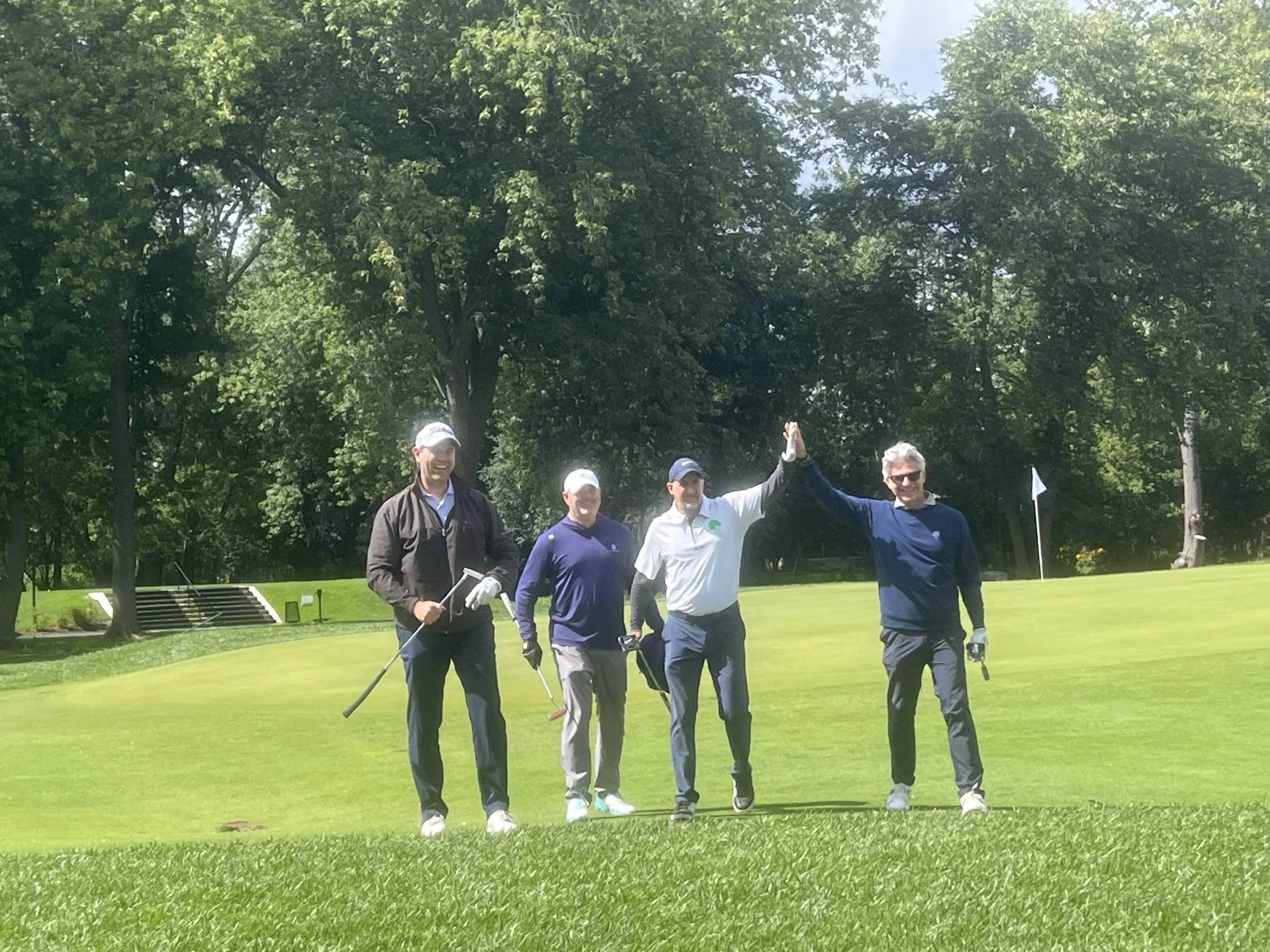 rick foursome hi five.jpg