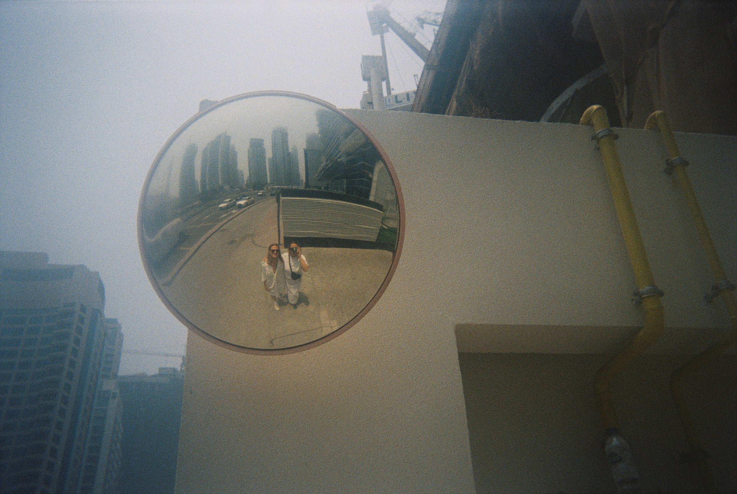 Hazy reflections. Dubai, 2024. Disposable Camera.