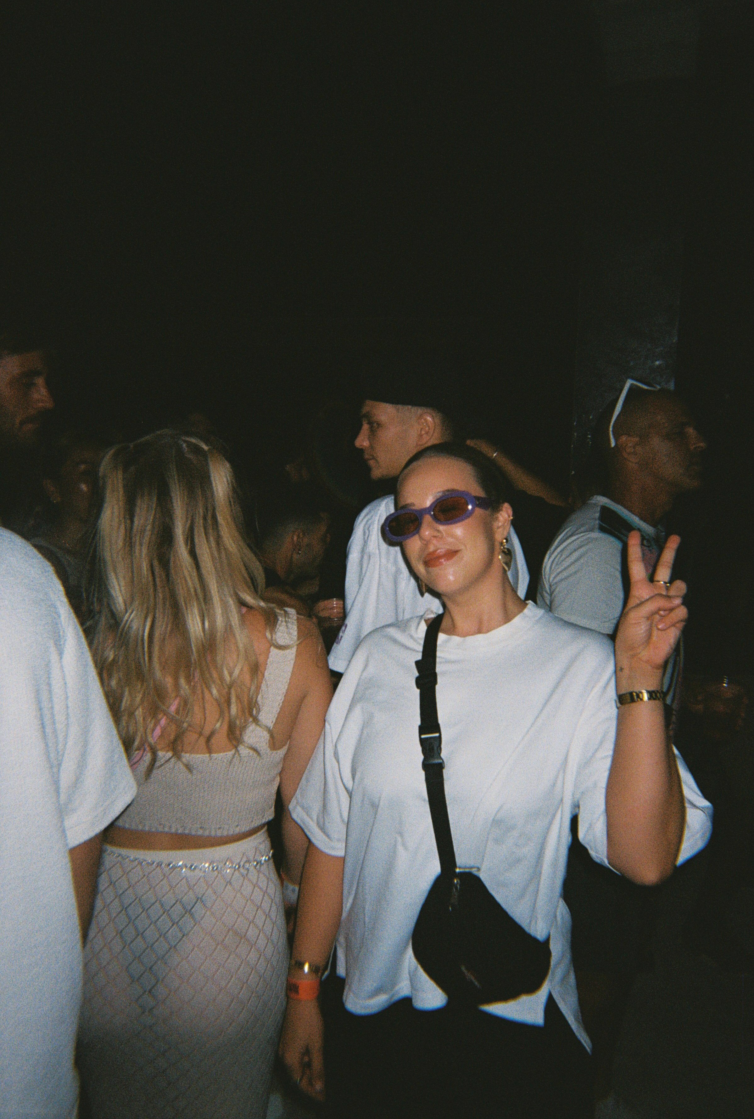 Party gal + booty. Cape Town, 2023. Disposable Camera.