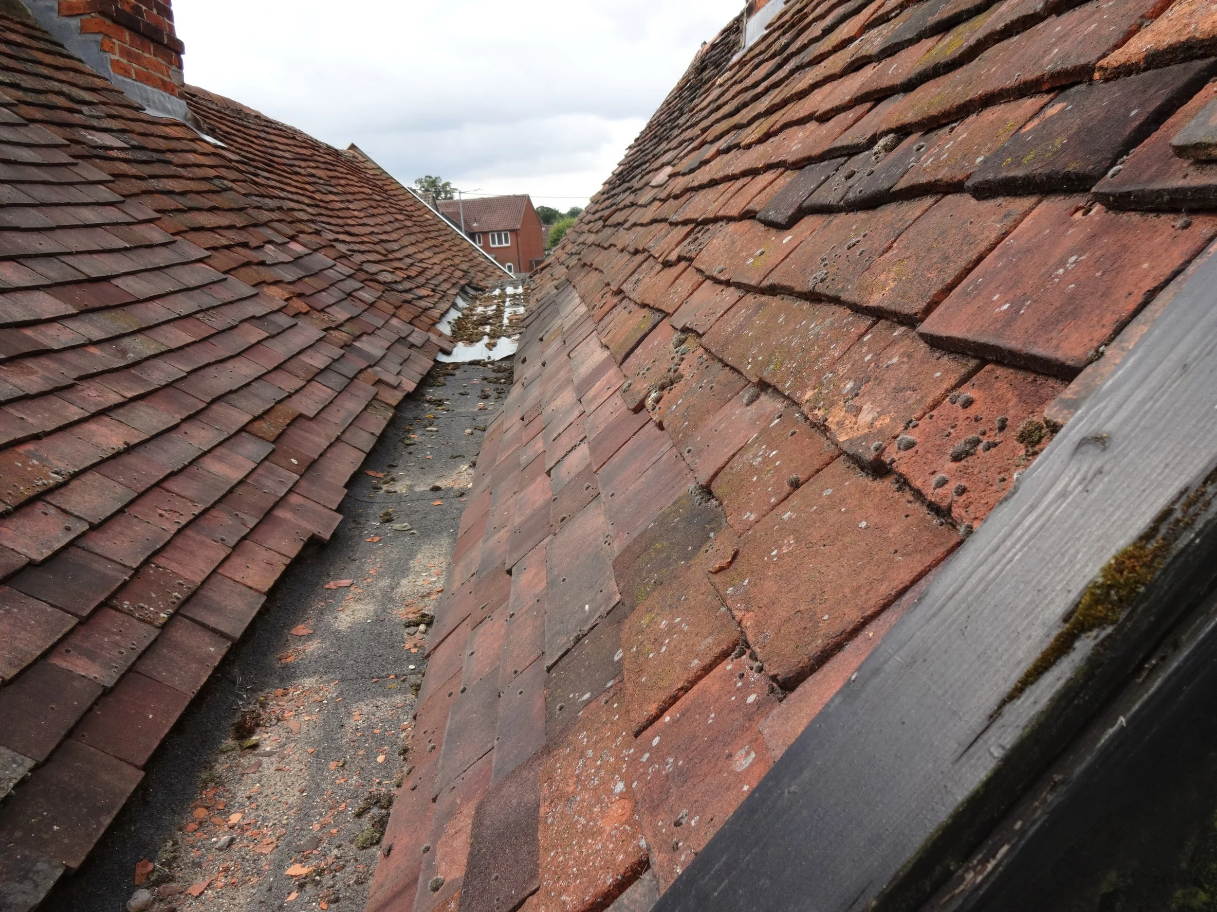 Another valley gutter between the roof structures