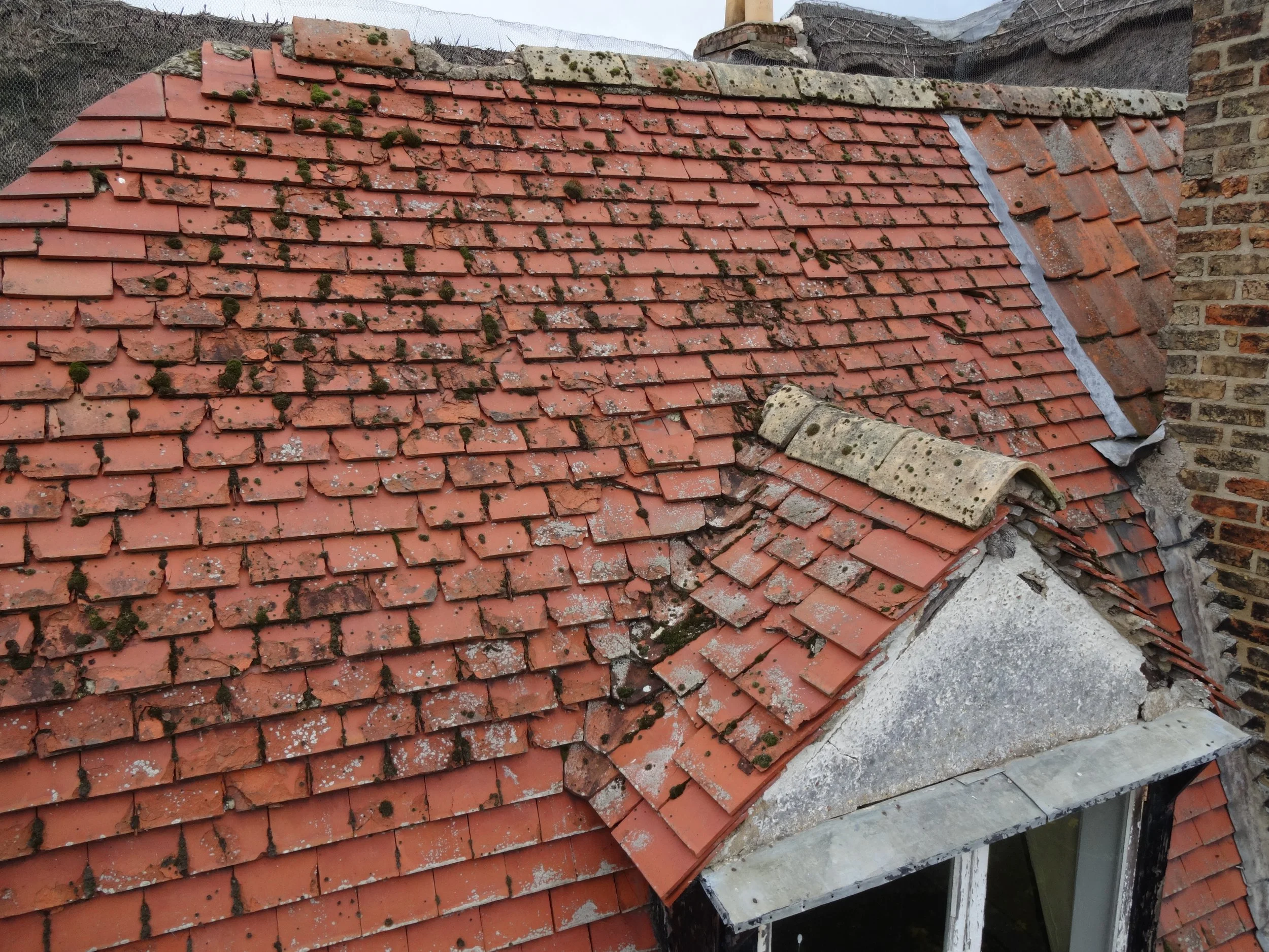 This roof covering has seen better days