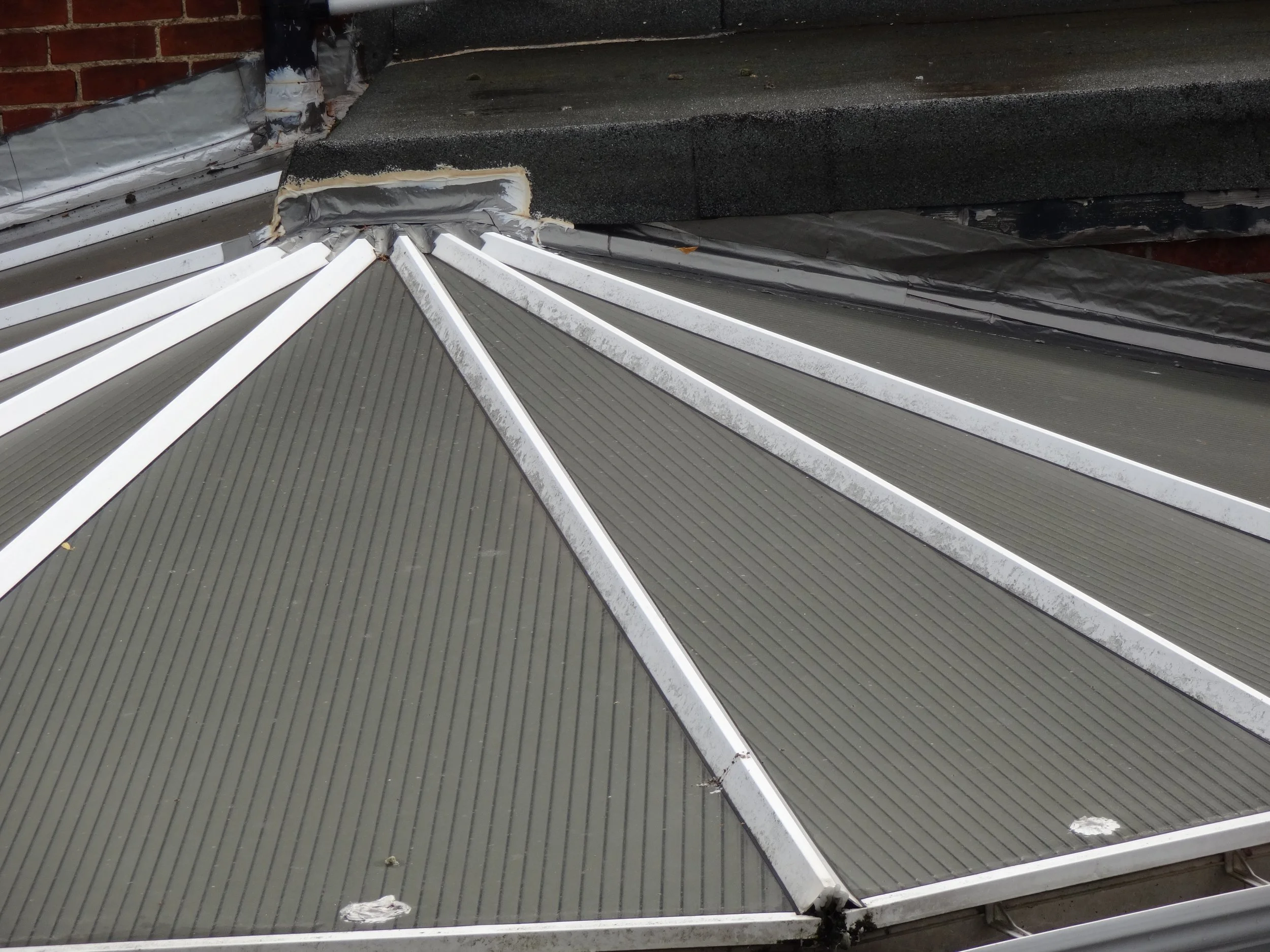 More temporary repairs to stop water ingress to the conservatory roof