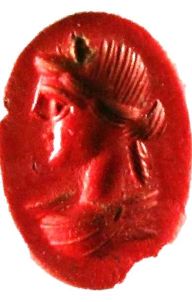 Red jasper intaglio possibly representing the god Apollo.