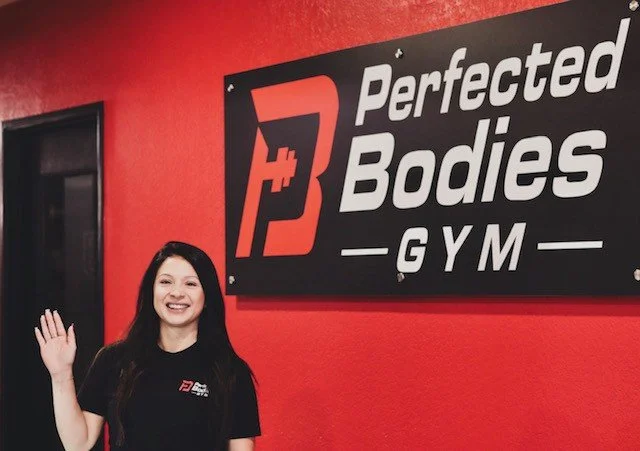 Perfected Bodies staff greeting members