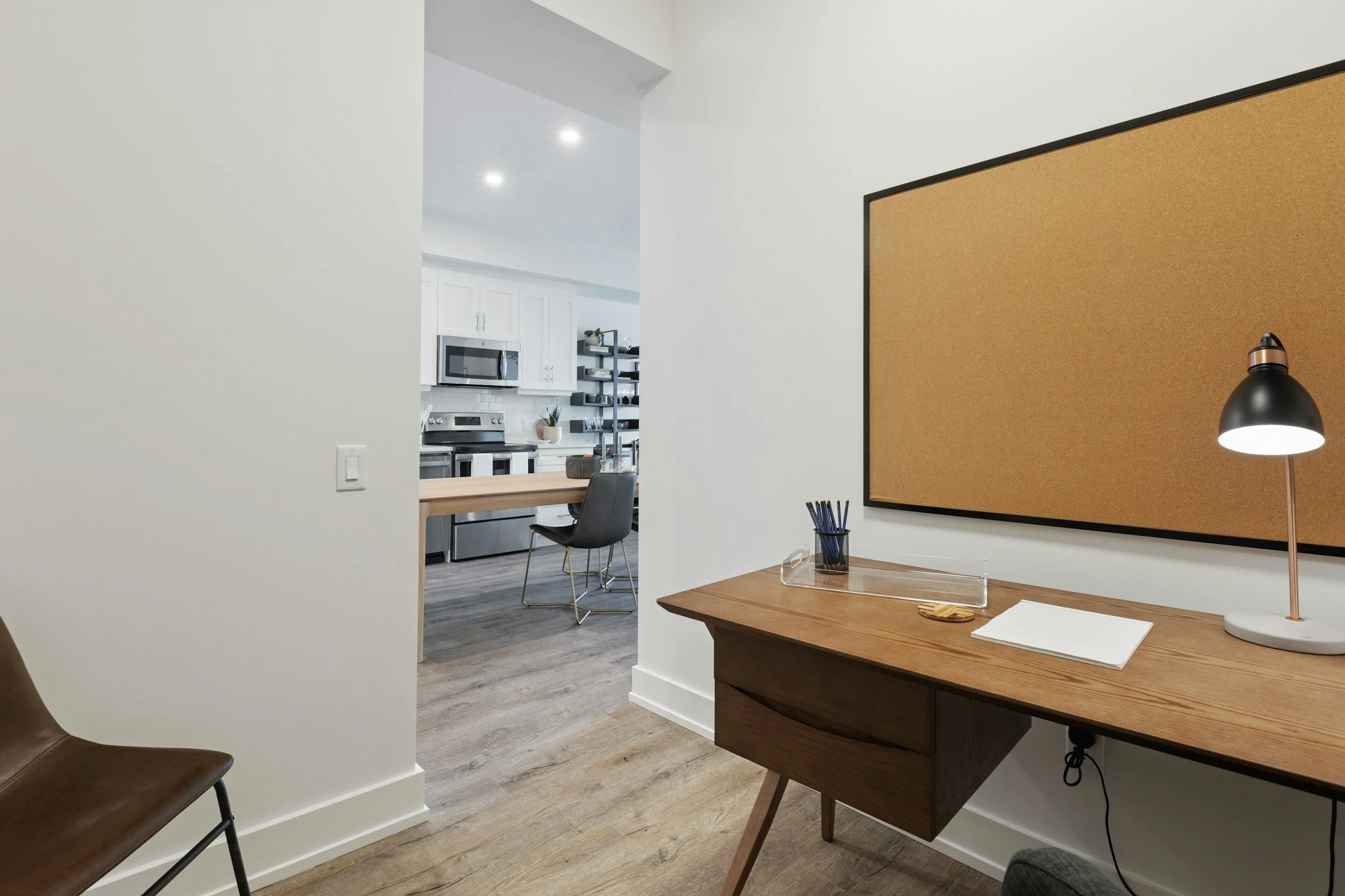 Landlord reviewing guaranteed rent documents in a Manchester apartment