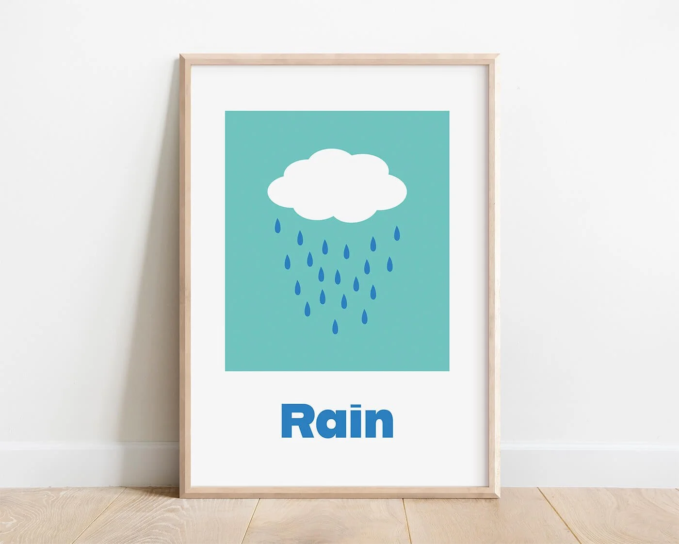 Modern rain cloud educational playroom print for early word association, shown framed on a white wall
