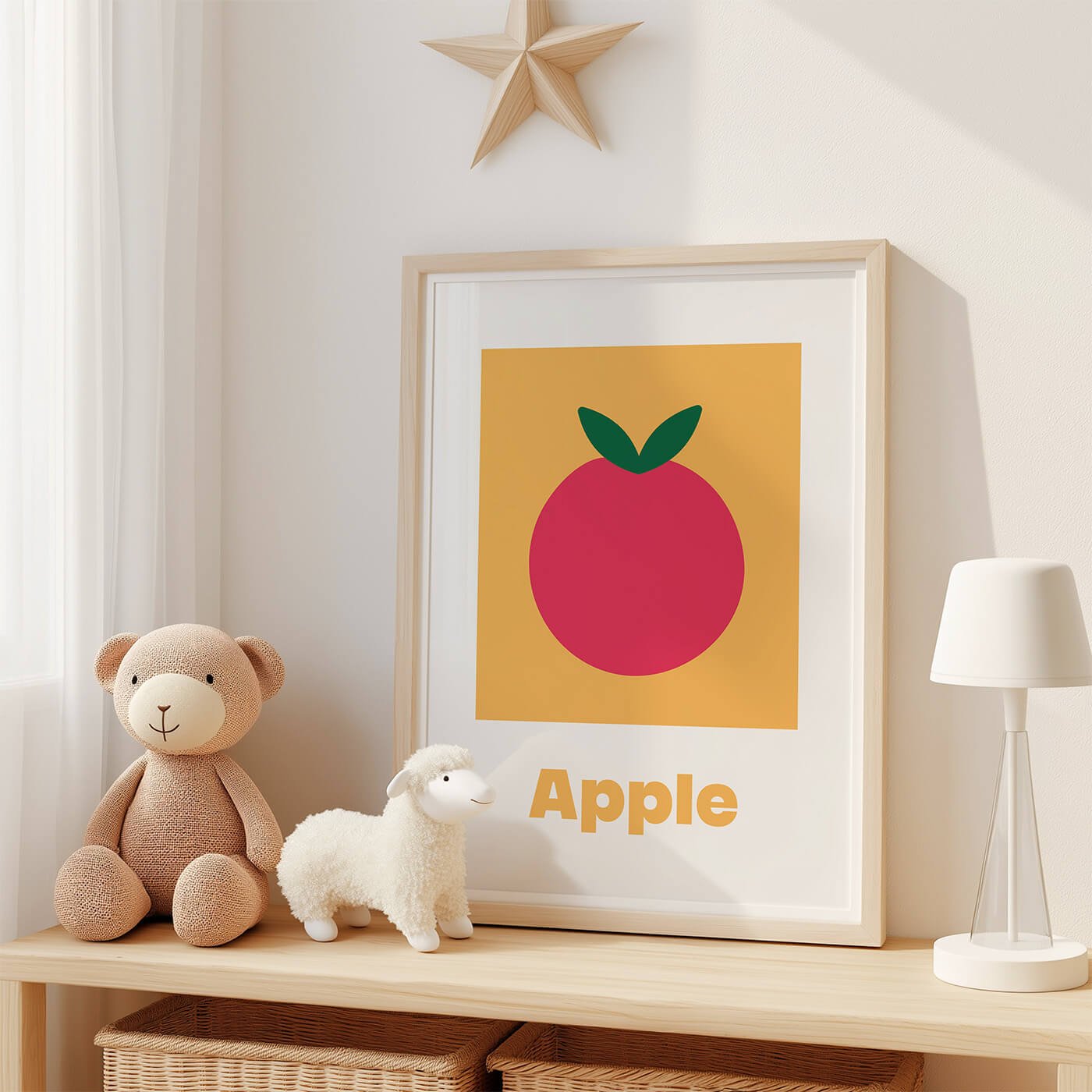 Apple Learning Print in a contemporary solid wood frame resting against a white interior wall.