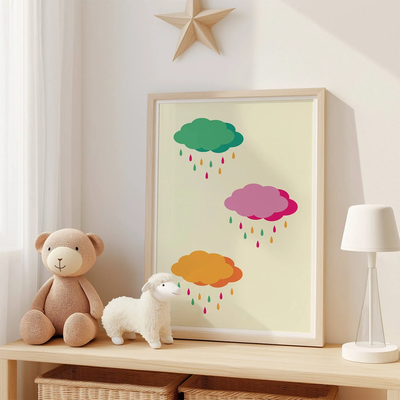 Framed rainbow wall art with clouds and colourful raindrops for a children's bedroom