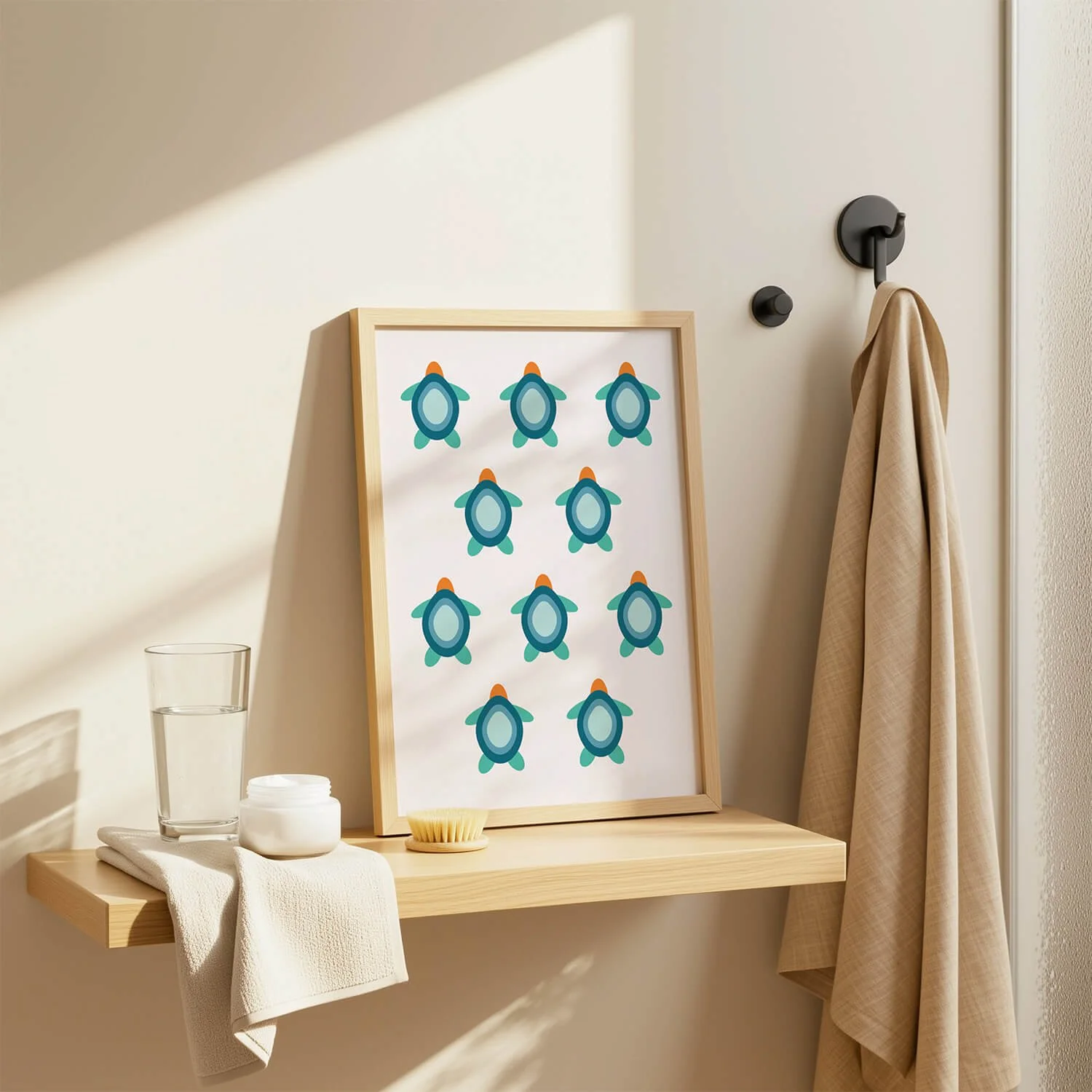 framed mini turtles print in green and blue shades displayed on minimalist bathroom shelf