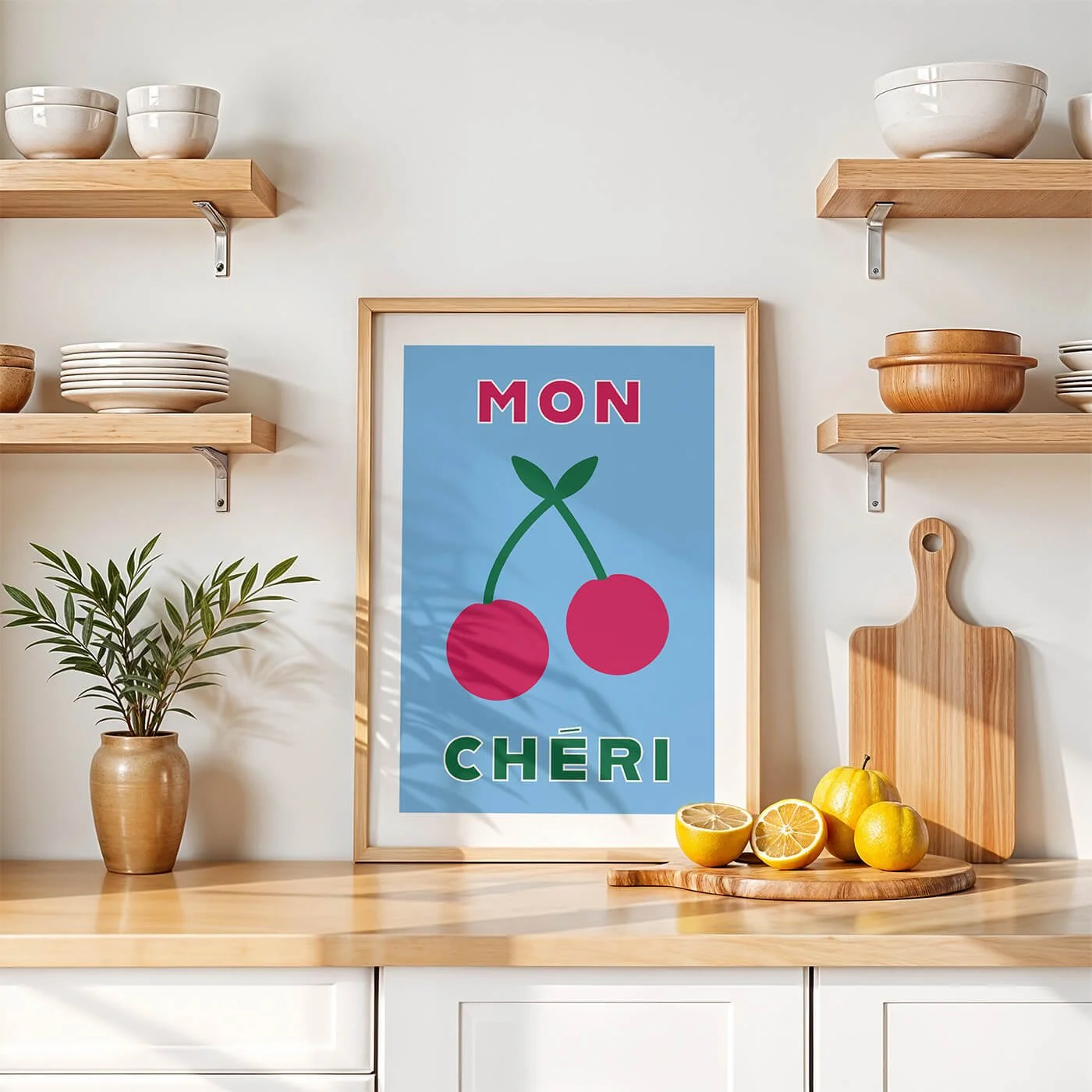 Blue Mon Cheri typography art print by Amatus in a wooden frame on a modern kitchen wall