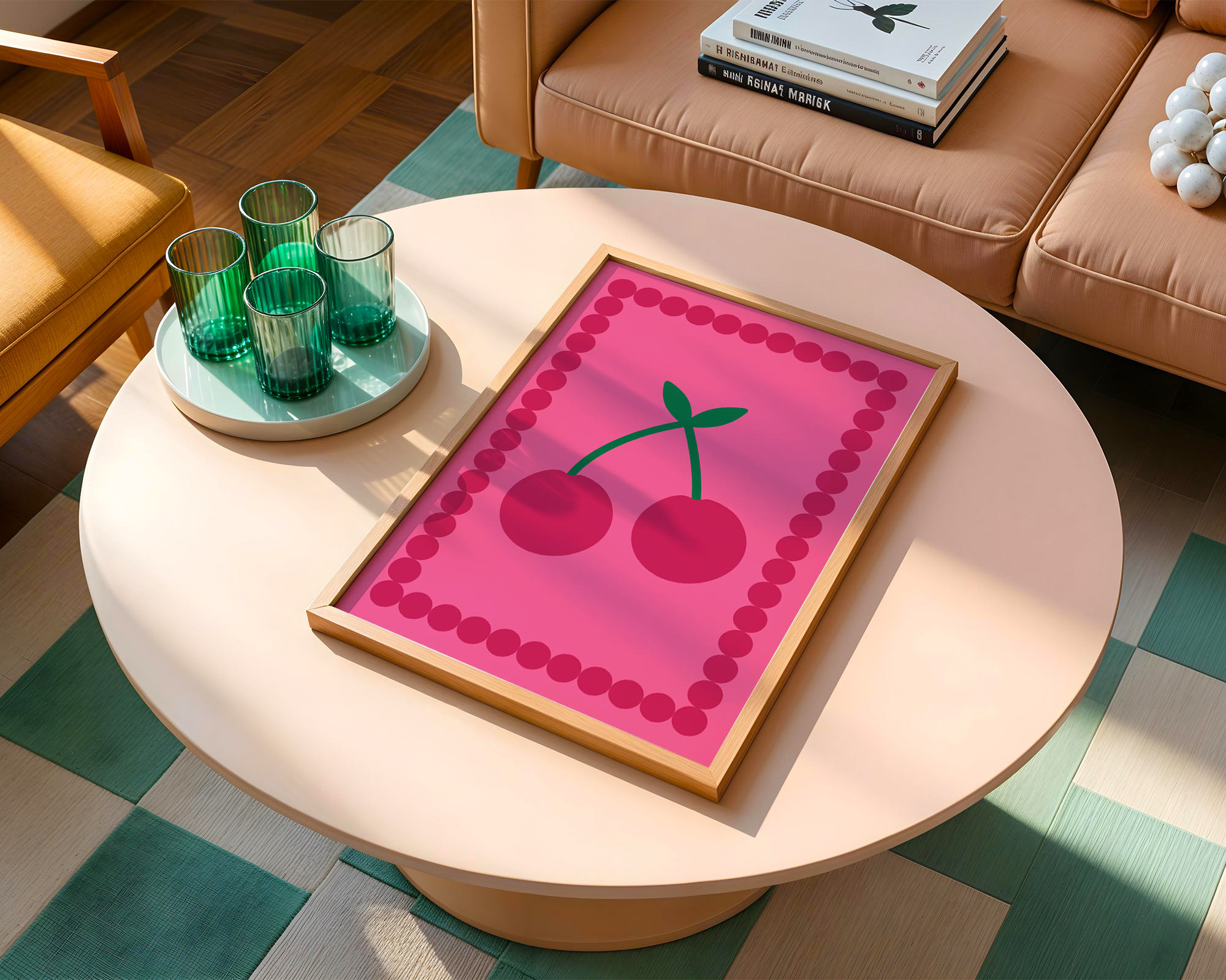 pretty pink cherry print on table next to glasses and sofa with books next to it