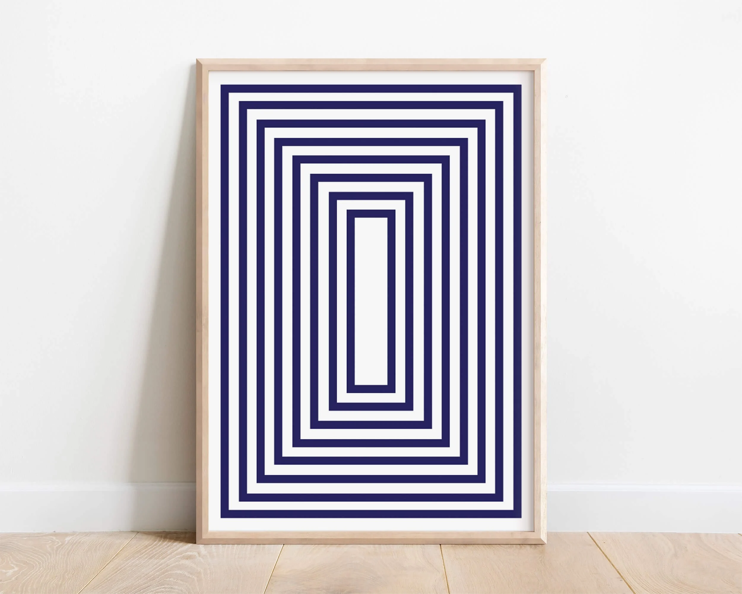 Framed modern bedroom wall art featuring geometric blue squares – minimalist abstract print for relaxed contemporary interiors
