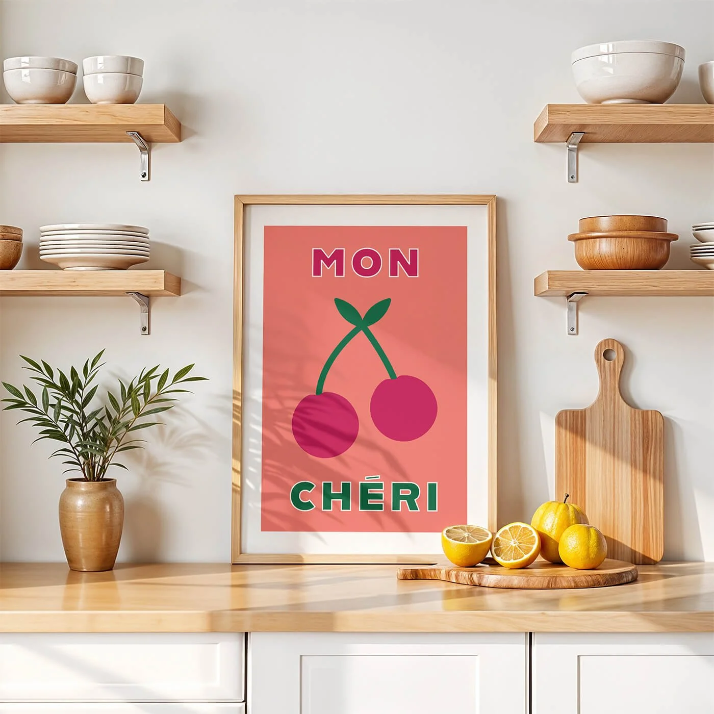 Pink Mon Cheri typography art print by Amatus in a wooden frame on a modern kitchen wall
