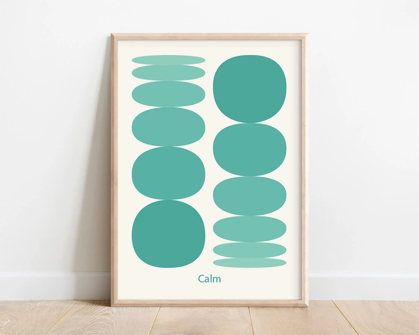 Green modern spherical shapes meditation print in a sleek frame on a white wall