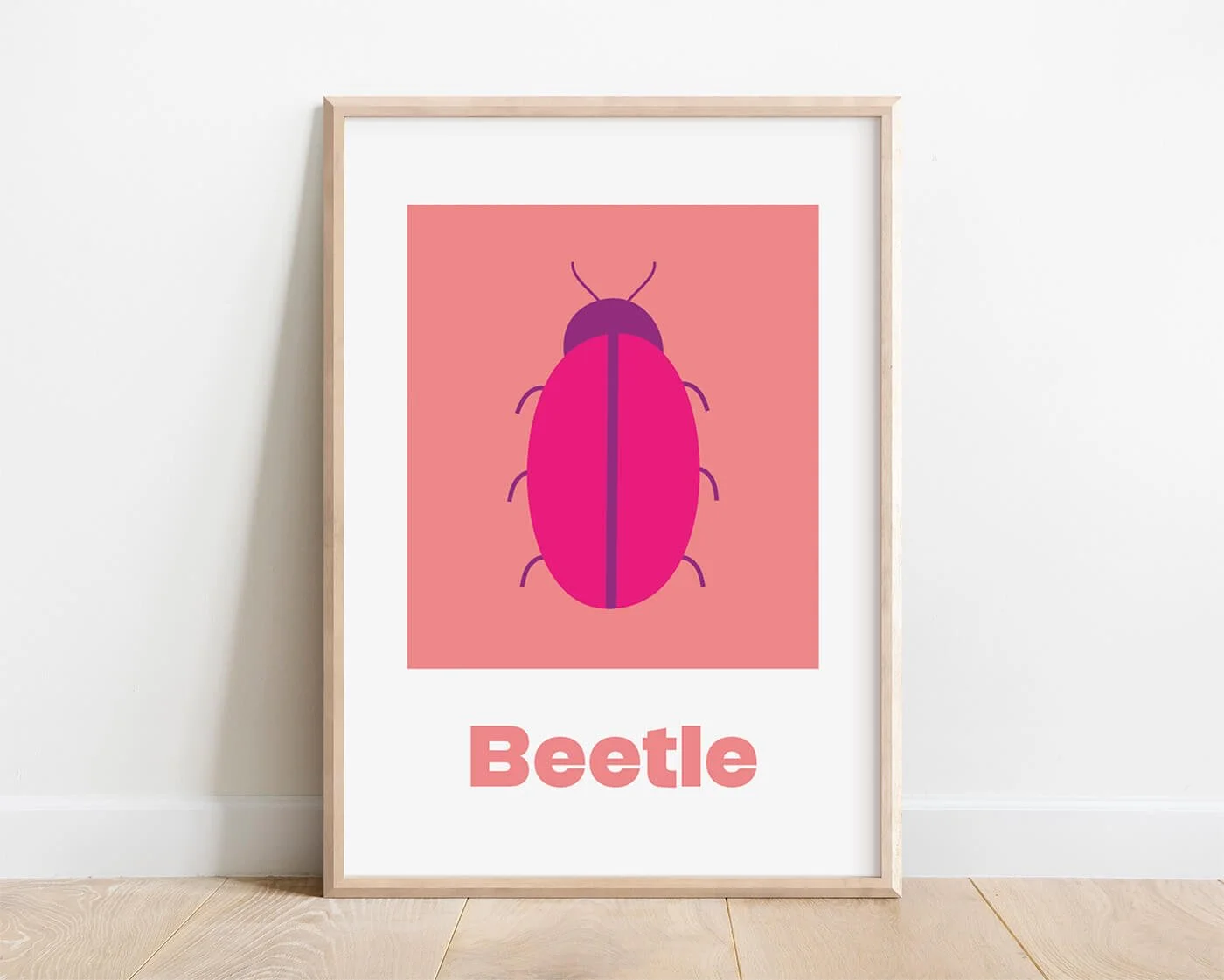 beetle Learning Print in a modern oak wooden frame displayed on a white interior wall. Contemporary moth illustration on a soft peach background with the word "Beetle" beneath