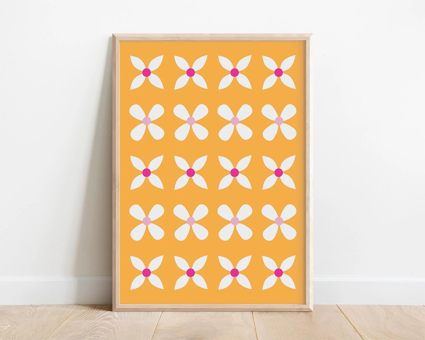 Modern Yellow Abstract Flowers Print with white flowers on a soft buttery yellow background in a contemporary wooden frame.