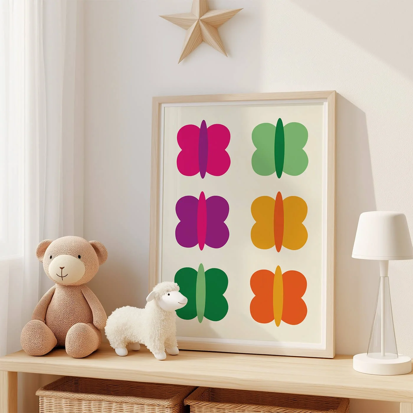 Framed butterfly art for kids displayed on shelf next to stuffed animal toys childrens room