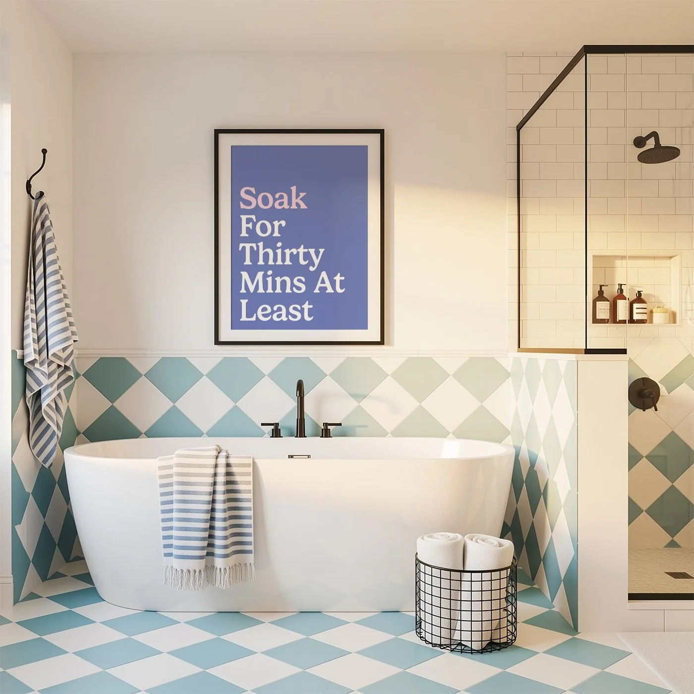 bold typography print in blue and white hanging above bath in blue coloured bathroom