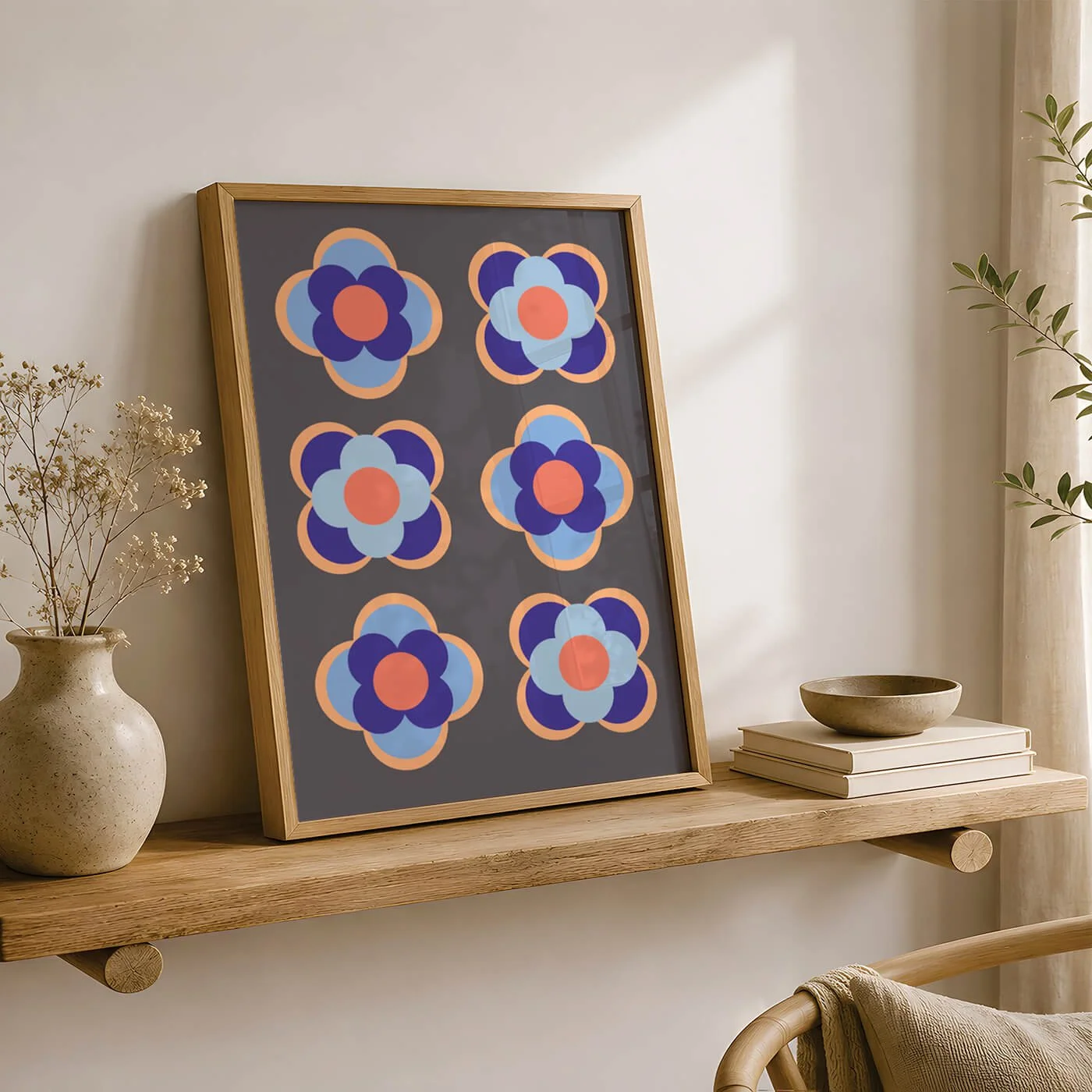 Contemporary blue geometric flower art print framed on an entryway console table, curated for a minimalist commercial interior