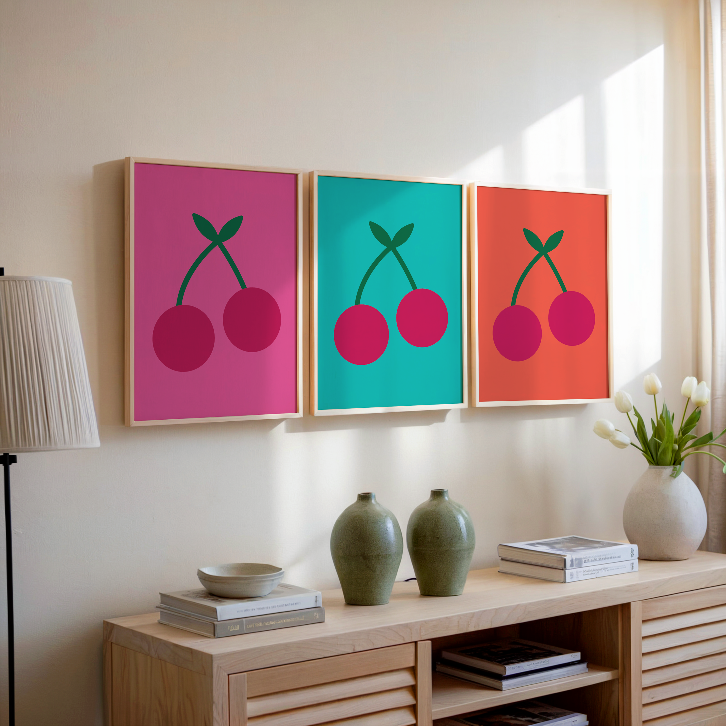 mon cheri print set above wooden sideboard