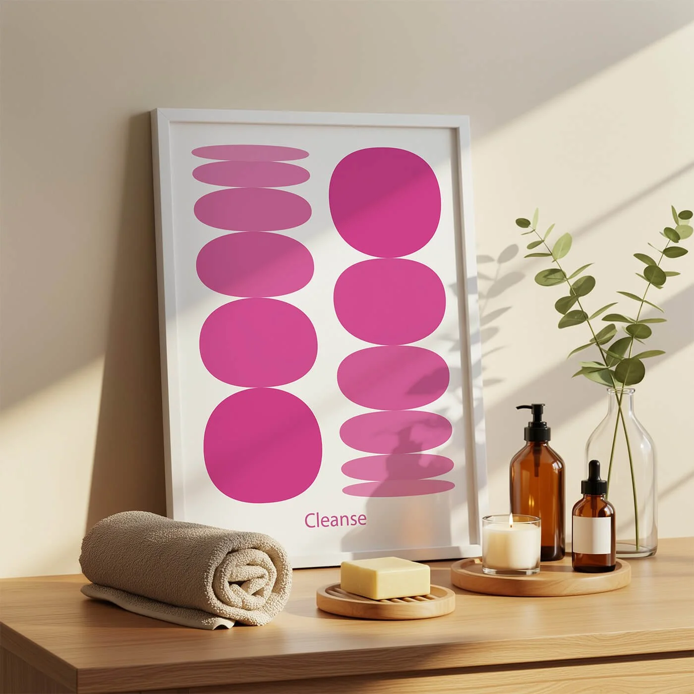 Framed contemporary art print titled Cleanse, depicting stacked magenta pink circles next to spa decor like towels and essential oils