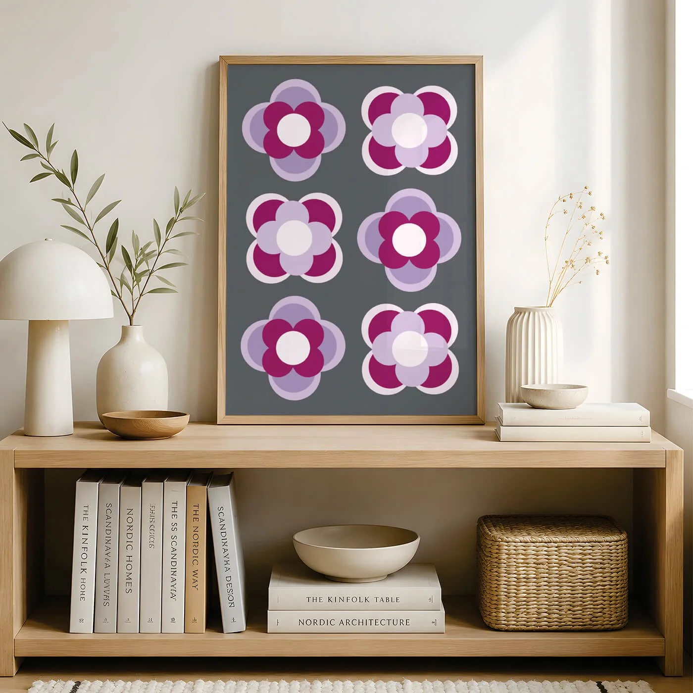 Purple contemporary flower print in a wooden frame displayed on a sideboard in a contemporary living room