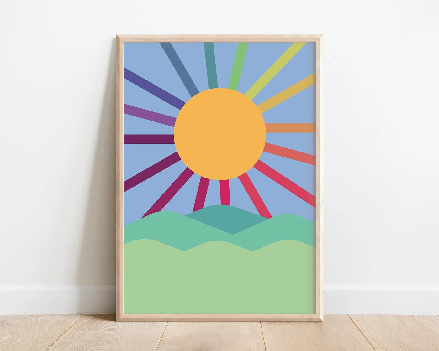 Colourful framed kids wall art featuring sun and rolling hills in a playful, gender-neutral design.