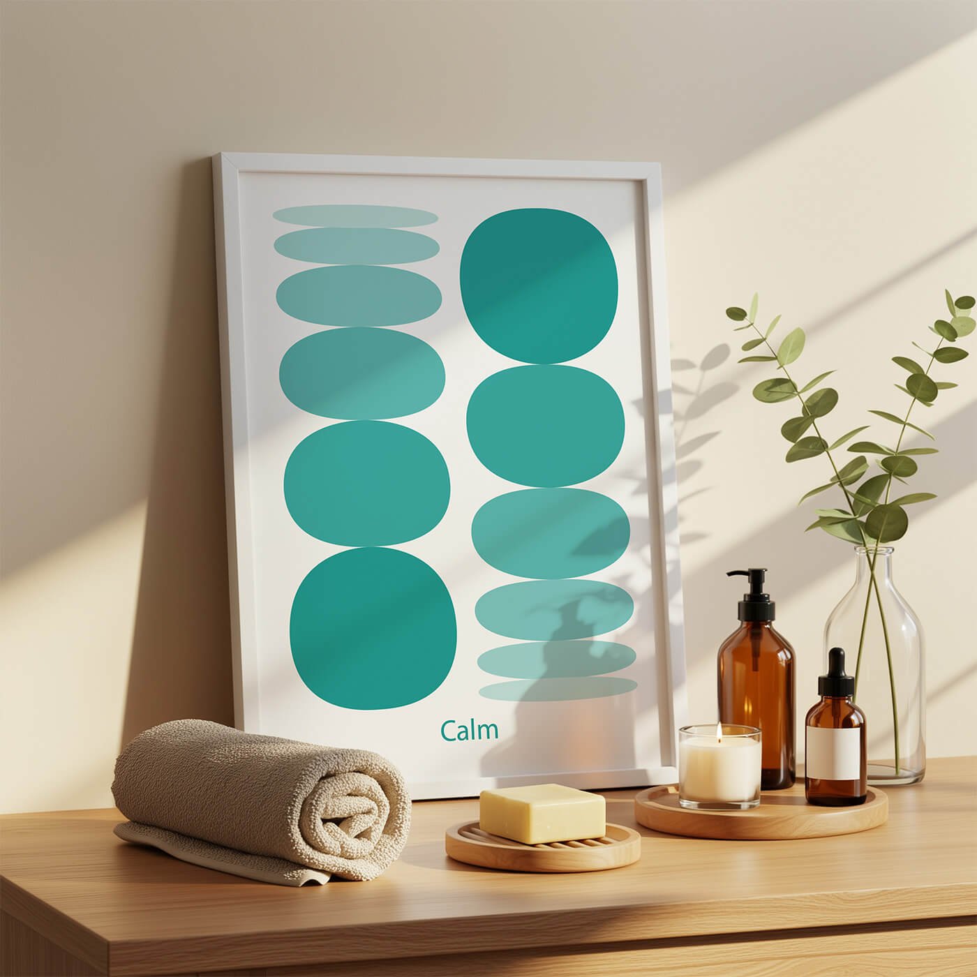 Framed minimalist art print titled Calm, featuring stacked abstract teal and light blue oval shapes on a wooden tabletop layout