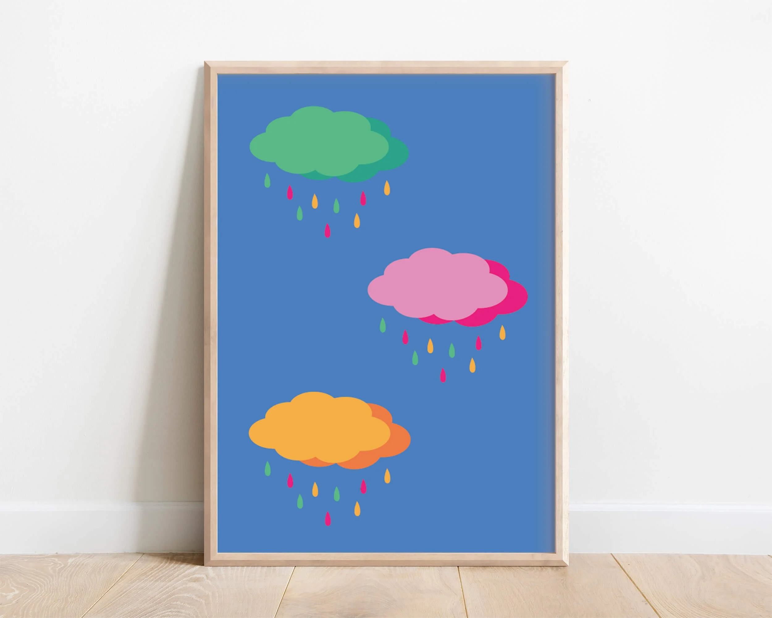 Vibrant rainbow wall art for kids with blue background, colourful raindrops, and playful cloud design