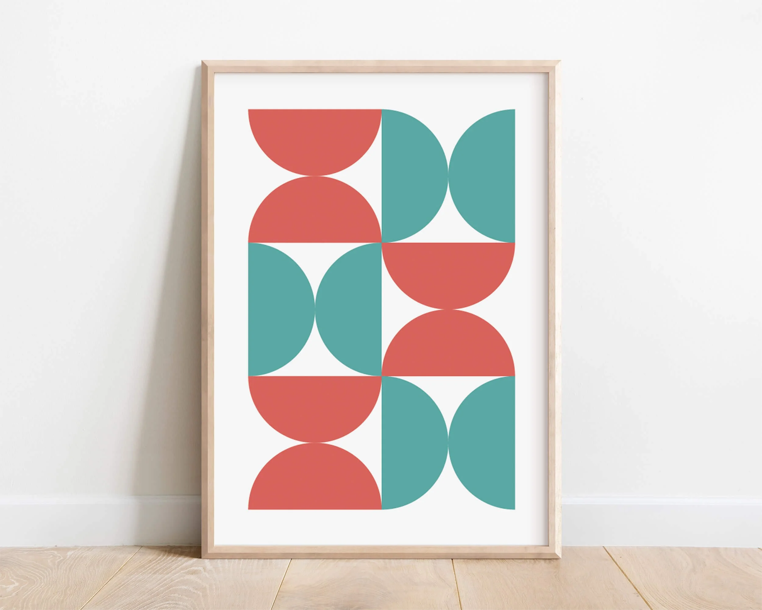 Framed abstract Bauhaus-inspired art print in green, coral, and white tones