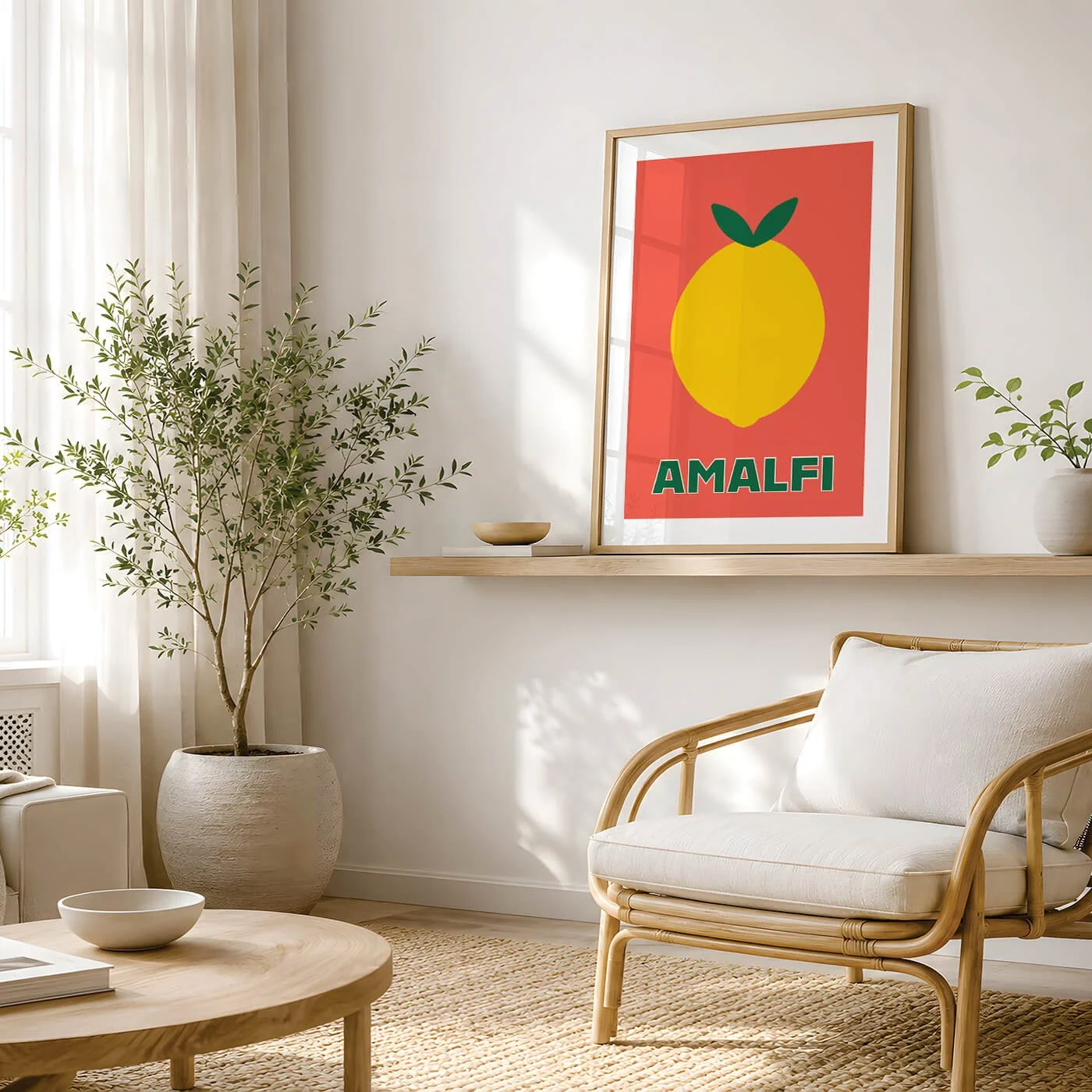 framed colourful lemon print in coral displayed on wall above wicker chair in neutral living room