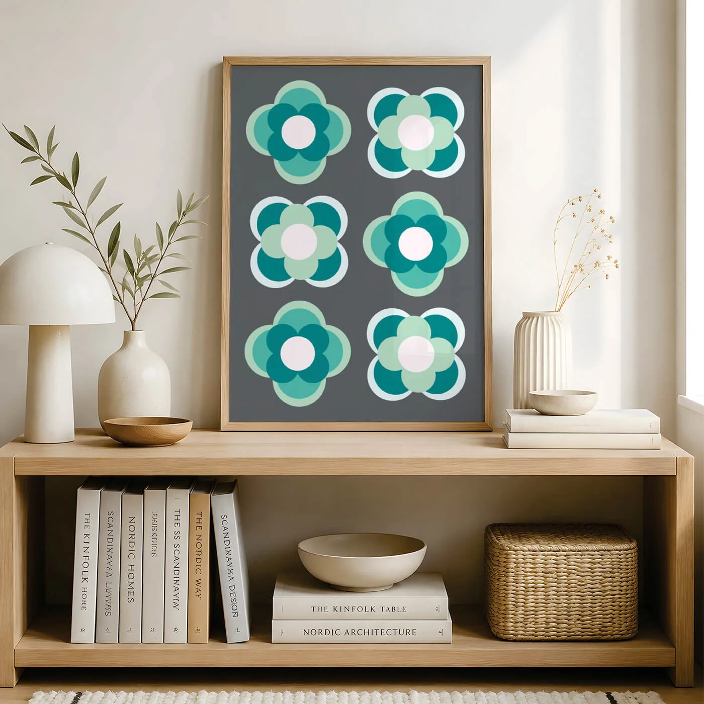 Green contemporary flower print in a wooden frame displayed on a sideboard in a contemporary living room