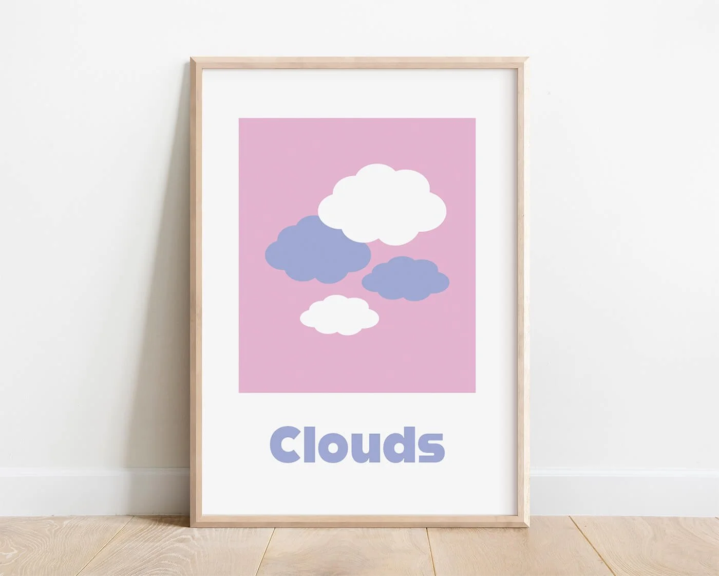 Educational pastel clouds word recognition print for kids, styled in a wooden frame on a white nursery wall