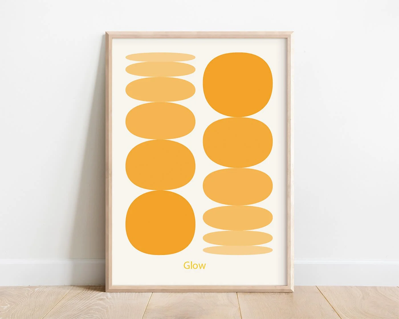 yellow modern spherical shapes boho decor print in a frame on a white wall