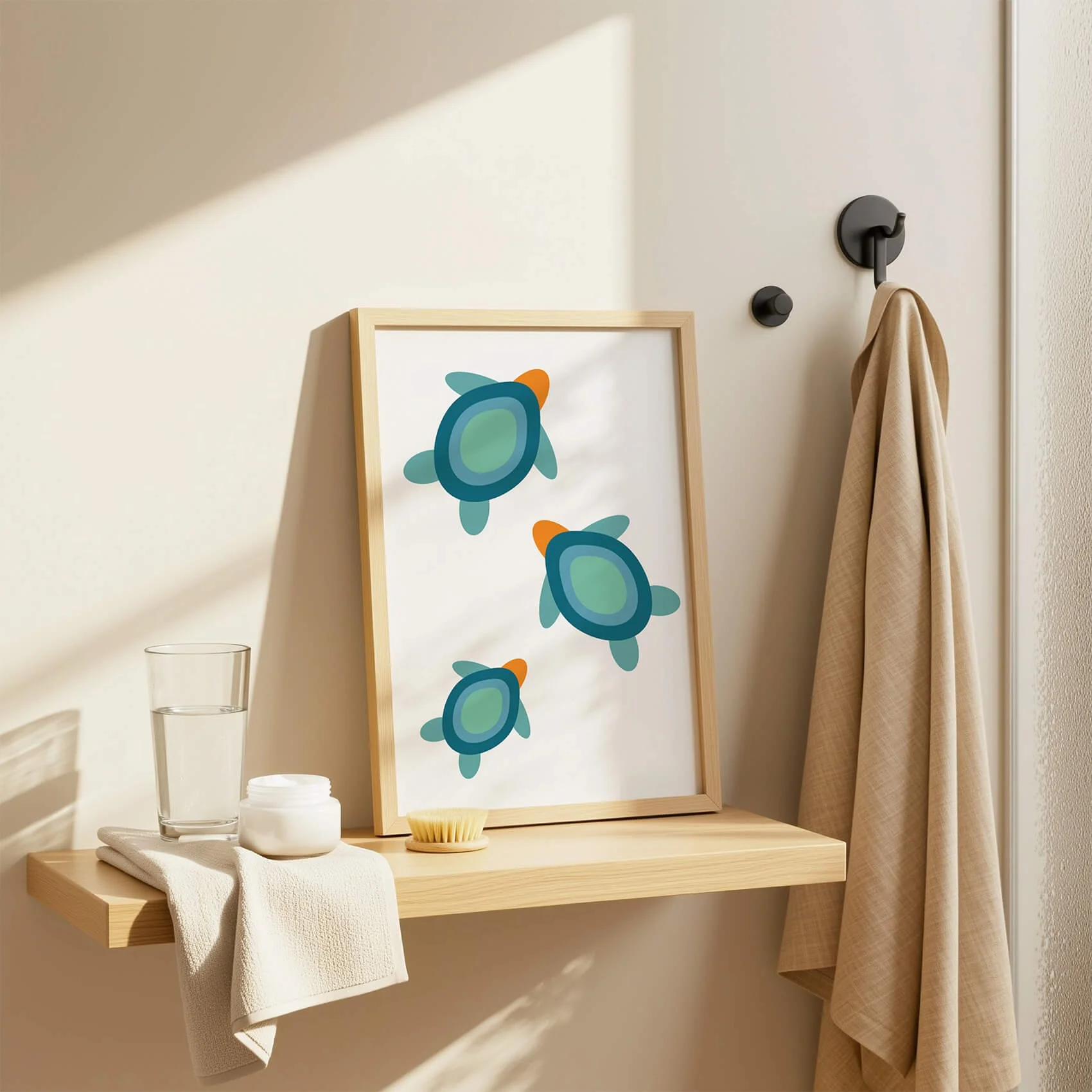 Framed bathroom wall art of green turtles displayed in modern clean bathroom shelf