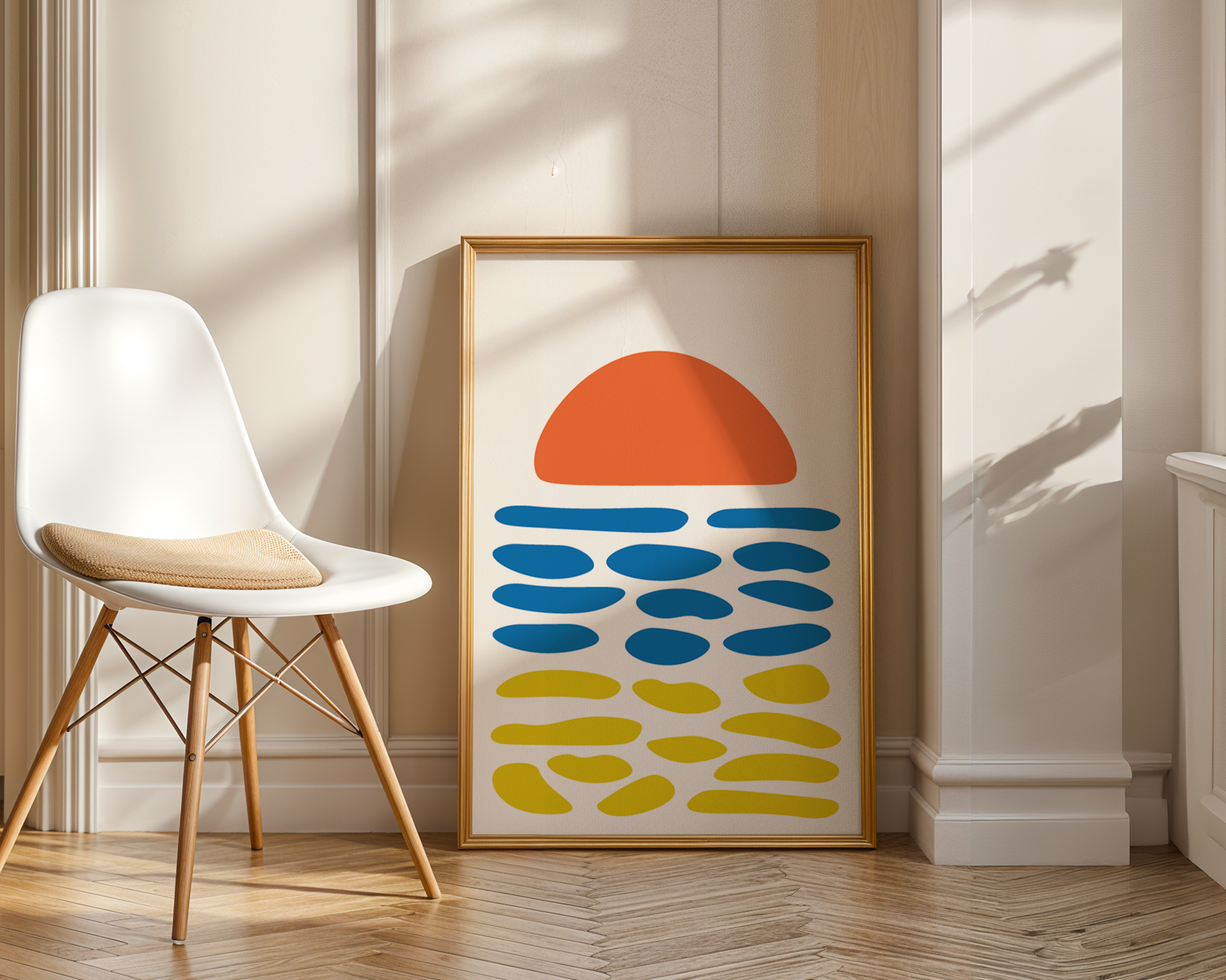 calming beach print in frame next to chair