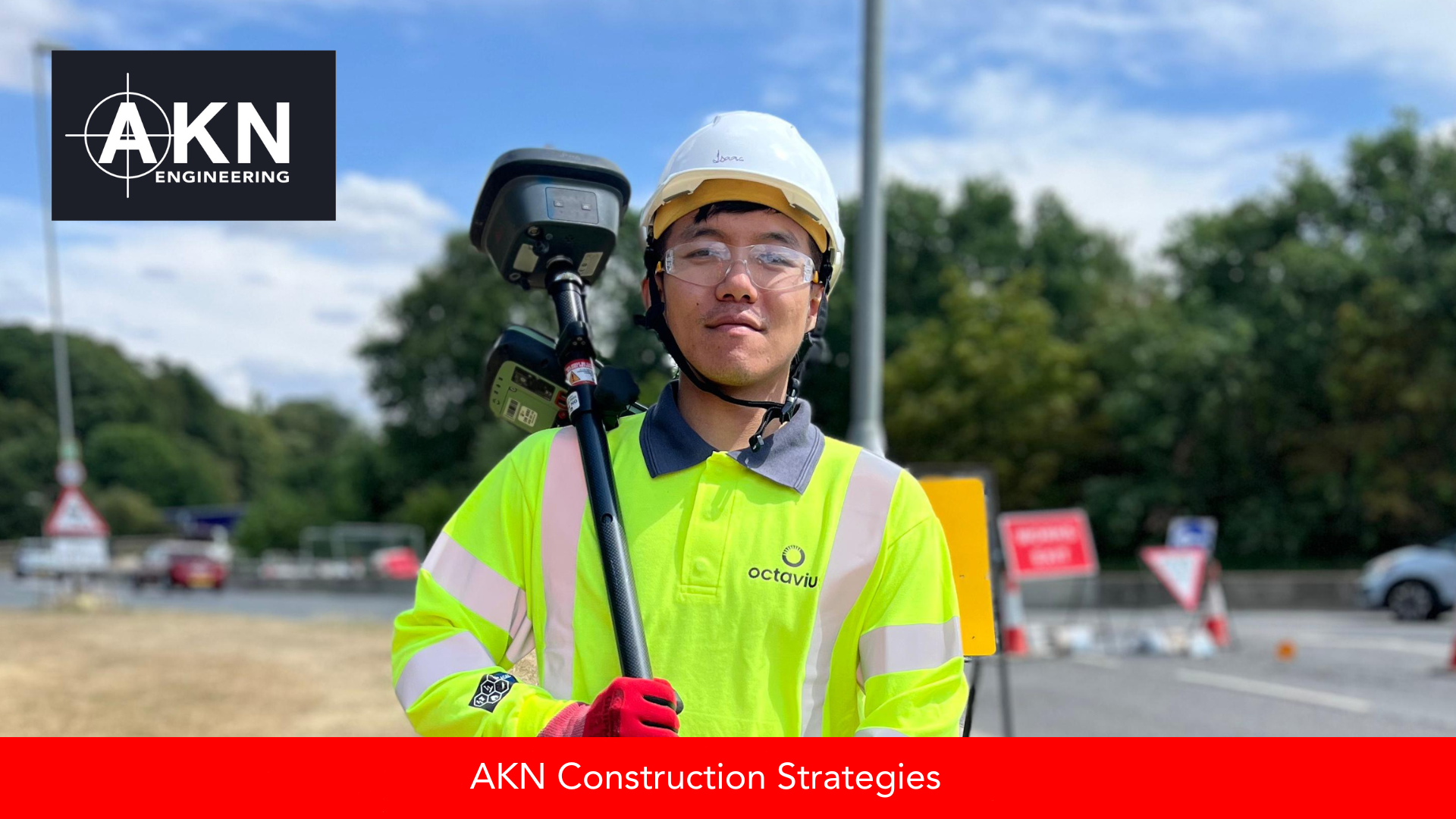 The engineer is on site carrying a GNSS rover, which he is using as part of an as-built survey to record the position of finished features.