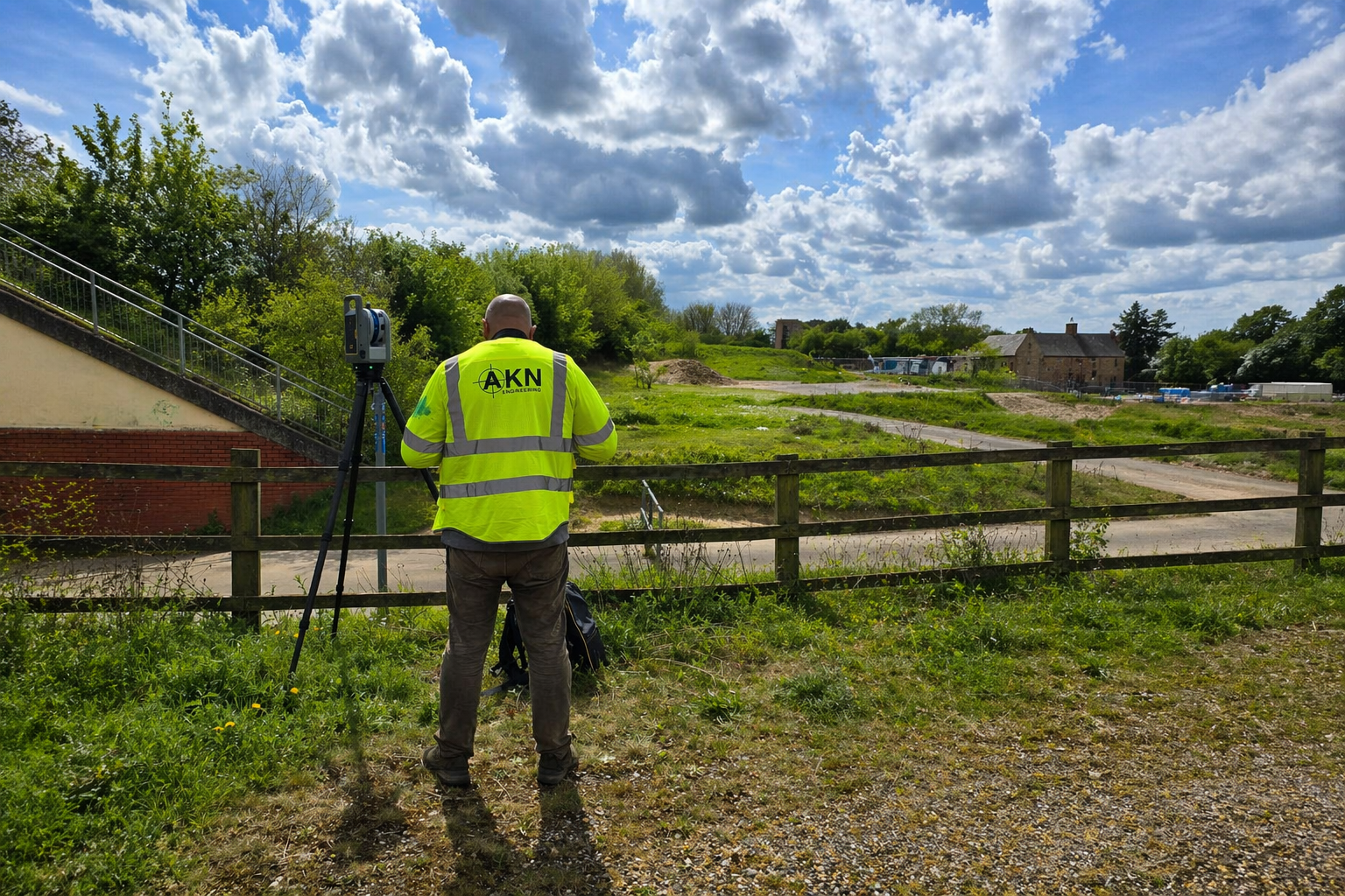 AKN Site Engineer in high vis PPE undertaking a 3D laser scanning survey