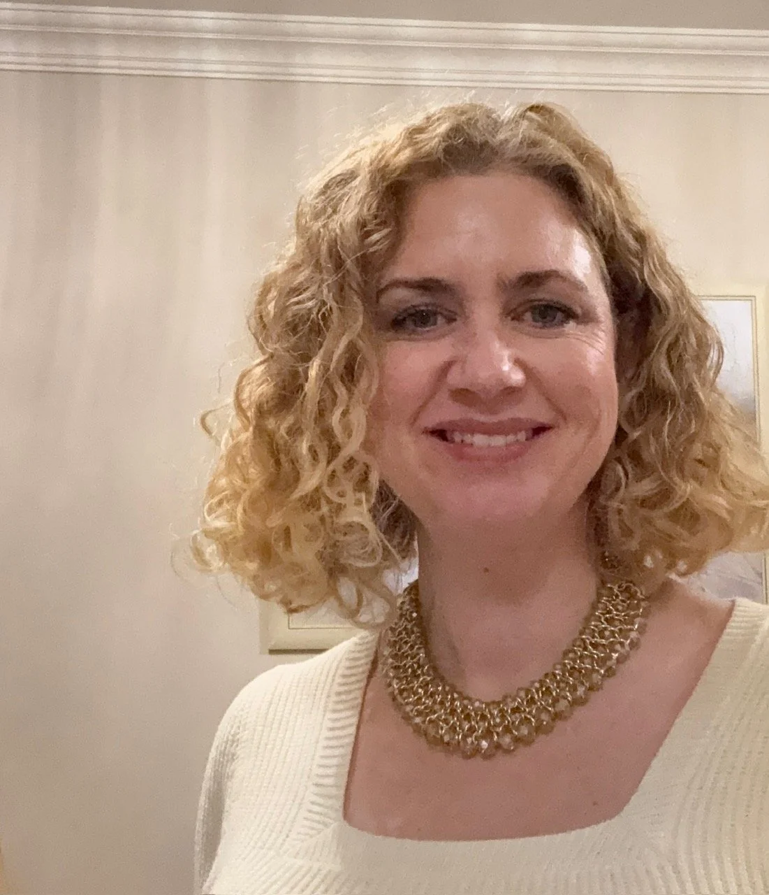 A smiling, friendly image of Louise Brennan parent coach