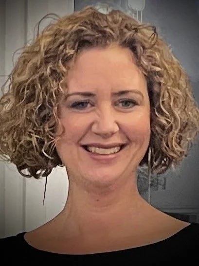 Parenting coach Louise Brennan smiling warmly at the camera